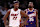 PHOENIX, ARIZONA - NOVEMBER 06: Jimmy Butler #22 of the Miami Heat and Kevin Durant #35 of the Phoenix Suns looks on during the game at Footprint Center on November 06, 2024 in Phoenix, Arizona. The Suns defeated the Heat 115-112. NOTE TO USER: User expressly acknowledges and agrees that, by downloading and or using this photograph, User is consenting to the terms and conditions of the Getty Images License Agreement. (Photo by Chris Coduto/Getty Images)