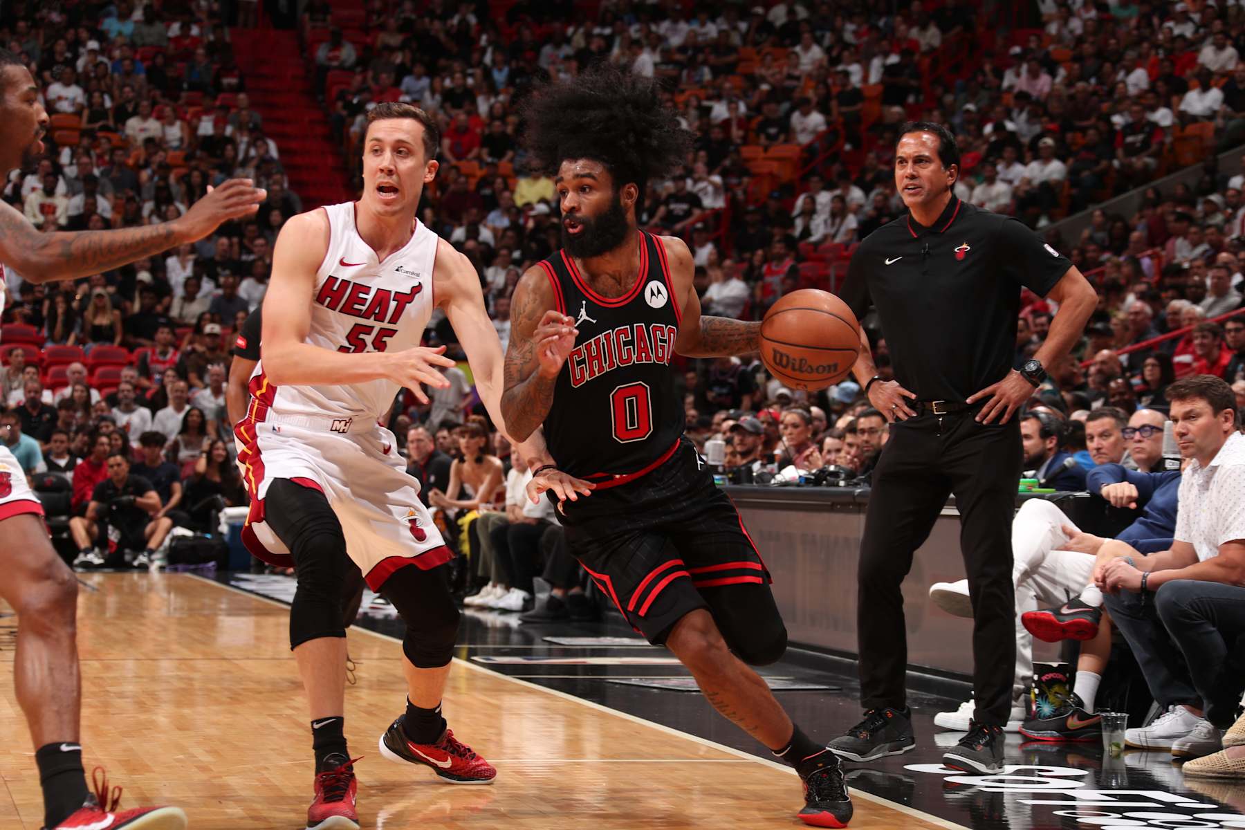 MIAMI, FL - APRIL 19: Coby White #0 of the Chicago Bulls handles the ball during the game against the Miami Heat during the 2024 Play-In Tournament on April 19, 2024 at Kaseya Center in Miami, Florida. NOTE TO USER: User expressly acknowledges and agrees that, by downloading and or using this Photograph, user is consenting to the terms and conditions of the Getty Images License Agreement. Mandatory Copyright Notice: Copyright 2024 NBAE (Photo by Issac Baldizon/NBAE via Getty Images)