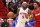 MIAMI, FLORIDA - MARCH 15: Jerami Grant #9 of the Detroit Pistons drives to the basket against Kyle Lowry #7 of the Miami Heat during the first half at FTX Arena on March 15, 2022 in Miami, Florida. NOTE TO USER: User expressly acknowledges and agrees that, by downloading and or using this photograph, User is consenting to the terms and conditions of the Getty Images License Agreement.  (Photo by Michael Reaves/Getty Images)
