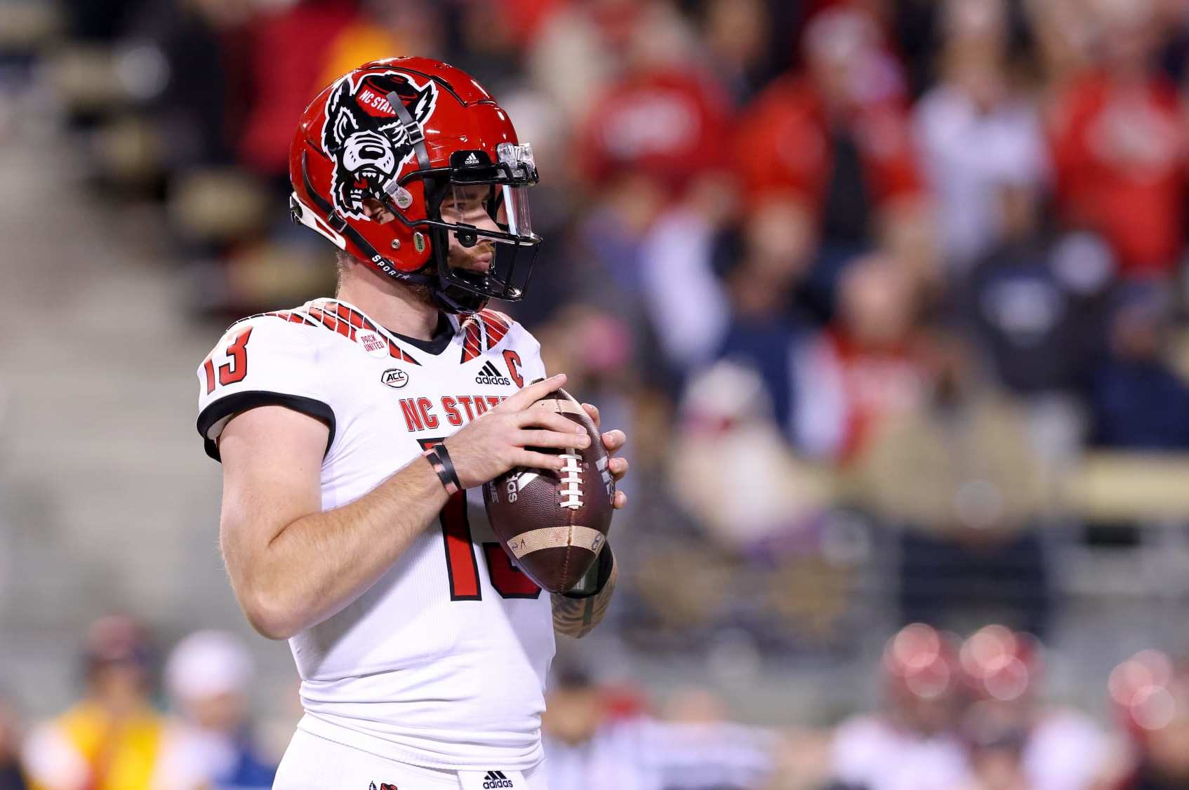 WINSTON-SALEM, NORTH CAROLINA - NOVEMBER 13: Devin Leary #13 of the North Carolina State Wolfpack looks on against the Wake Forest Demon Deacons during their game at Truist Field on November 13, 2021 in Winston-Salem, North Carolina. Wake Forest won 45-42. (Photo by Grant Halverson/Getty Images)