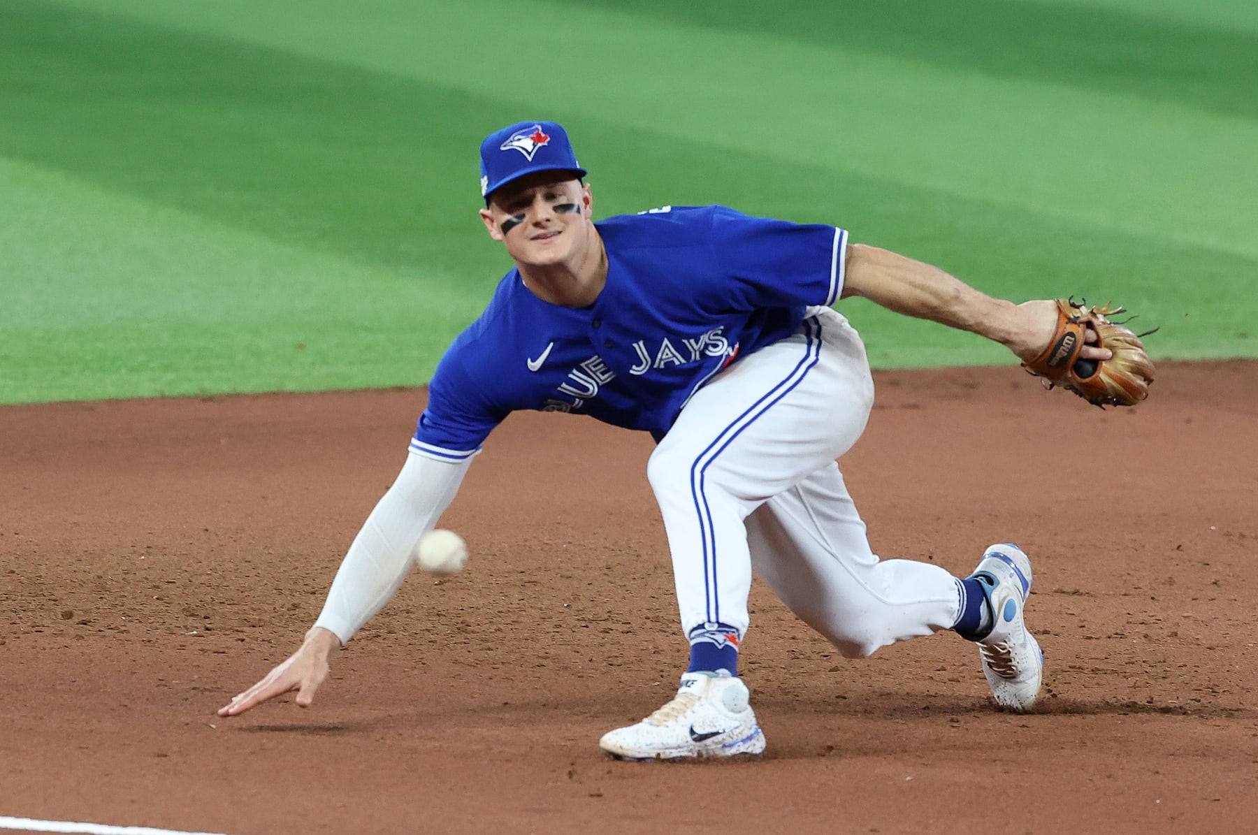 TORONTO, ON - OCTOBER 7 - Toronto Blue Jays third baseman Matt Chapman (26) cannot get to a Seattle Mariners right fielder Mitch Haniger (17) double as the Toronto Blue Jays fall to the Seattle Mariners 4-0 in game one of their American League Wild Card series at Rogers Centre in Toronto. October 7, 2022. (Steve Russell/Toronto Star via Getty Images)