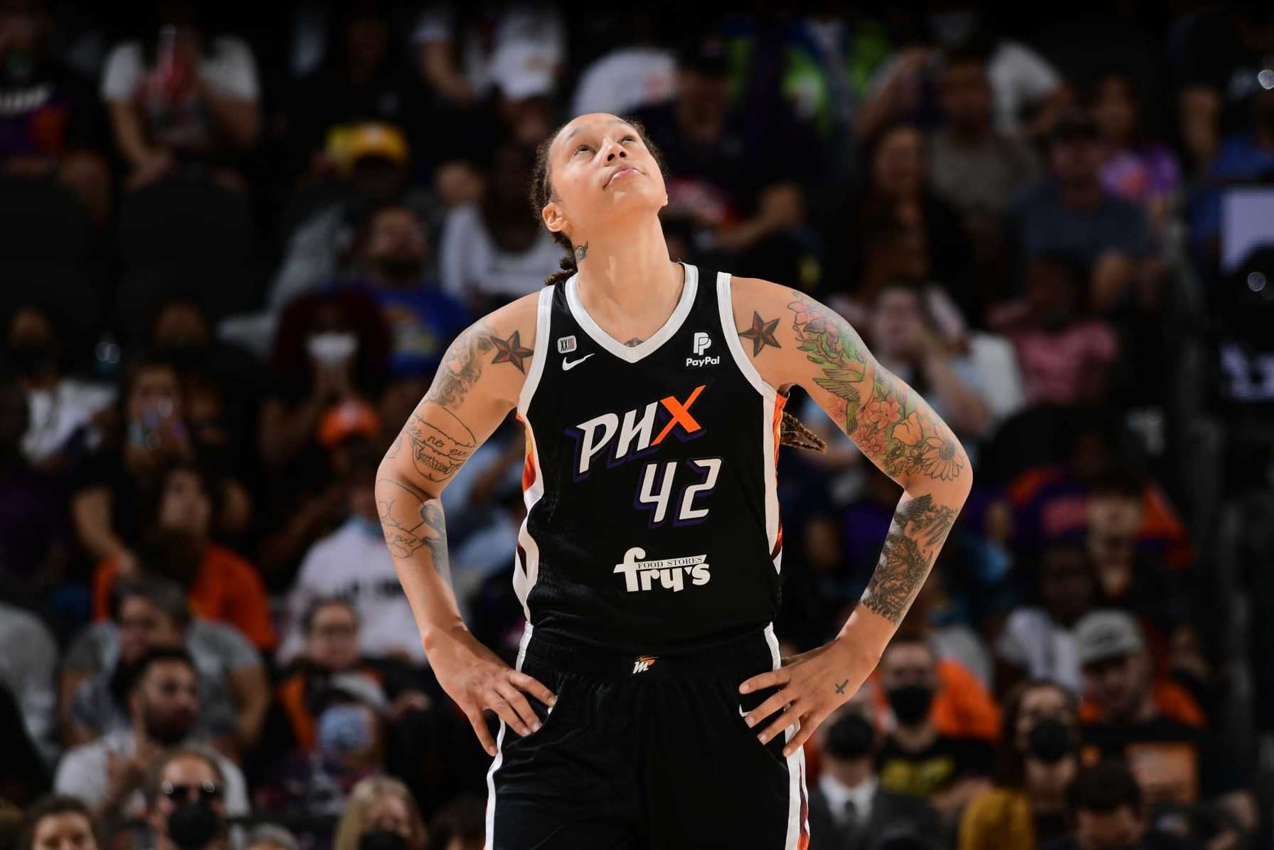 PHOENIX, AZ - OCTOBER 13: Brittney Griner #42 #3 of the Phoenix Mercurylooks on during the game against the Chicago Sky during Game Two of the 2021 WNBA Finals on October 13, 2021 at Footprint Center in Phoenix, Arizona. NOTE TO USER: User expressly acknowledges and agrees that, by downloading and or using this photograph, user is consenting to the terms and conditions of the Getty Images License Agreement. Mandatory Copyright Notice: Copyright 2021 NBAE (Photo by Michael Gonzales/NBAE via Getty Images)