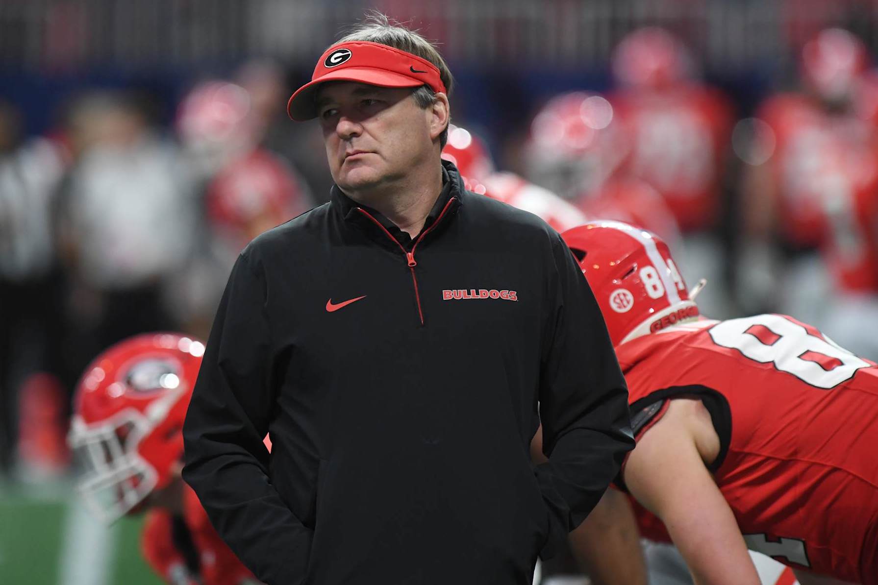 ATLANTA, GA - DECEMBER 07: Georgia Bulldogs head coach Kirby Smart looks on prior to the SEC Championship game between the Georgia Bulldogs and the Texas Longhorns on December 07, 2024, at Mercedes-Benz Stadium in Atlanta, GA. (Photo by Jeffrey Vest/Icon Sportswire via Getty Images)