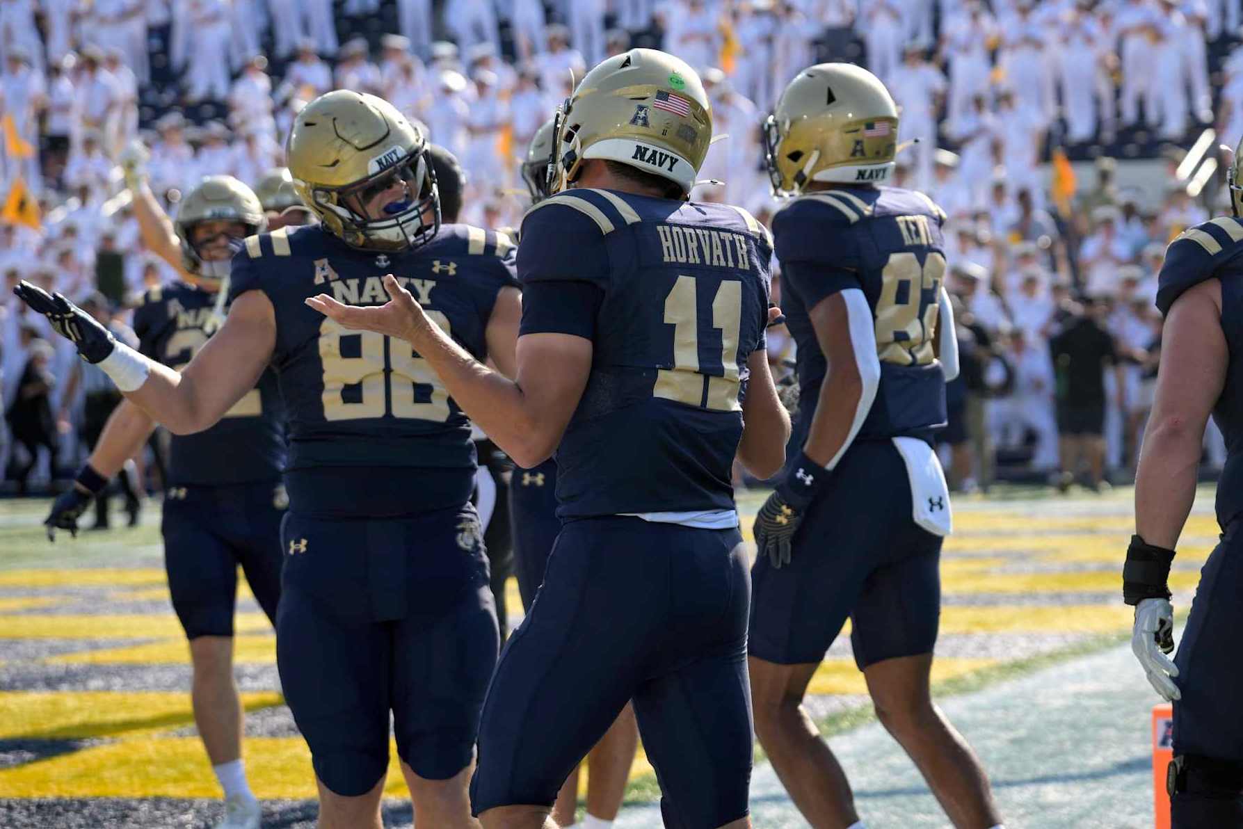 ANNAPOLIS, MD - SEPTEMBER 21:  Navy Midshipmen quarterback Blake Horvath (11) reacts with tight end Thomas Scully (88) following his touchdown run during the Memphis Tigers game versus the Naval Academy Midshipmen on September 21, 2024 at Navy - Marine Corps Memorial Stadium in Annapolis, MD. (Photo by Mark Goldman/Icon Sportswire via Getty Images)