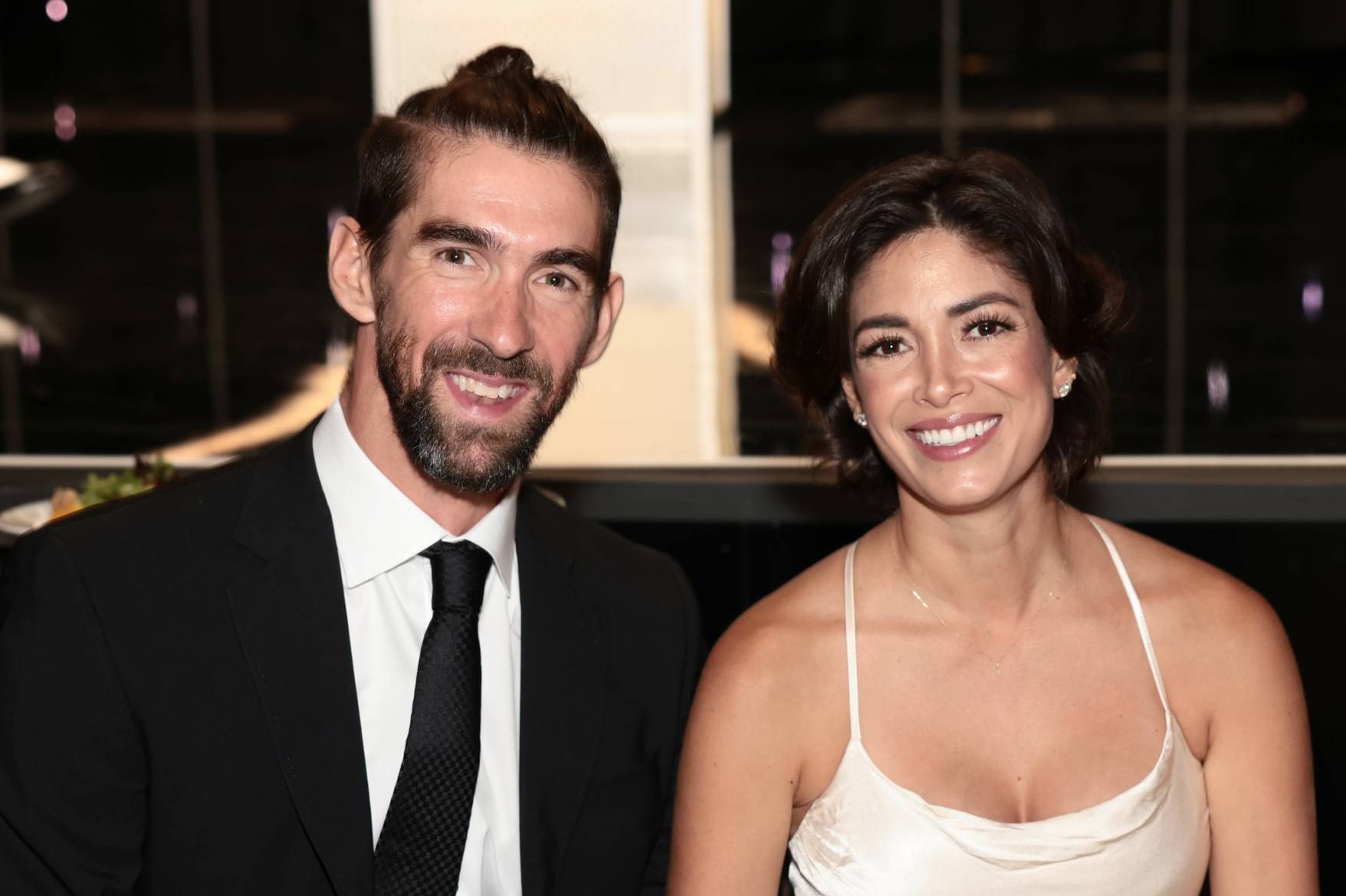 BEVERLY HILLS, CALIFORNIA - AUGUST 18: (L-R) Michael Phelps and Nicole Johnson attend the Harold & Carole Pump Foundation 2023 Gala at The Beverly Hilton on August 18, 2023 in Beverly Hills, California. (Photo by Tiffany Rose/Getty Images for Harold & Carole Pump Foundation)