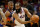 PHOENIX, ARIZONA - MARCH 27: James Harden #1 of the Philadelphia 76ers handles the ball against Chris Paul #3 of the Phoenix Suns during the second half of the NBA game at Footprint Center on March 27, 2022 in Phoenix, Arizona. The Suns defeated the 76ers 114-104.  NOTE TO USER: User expressly acknowledges and agrees that, by downloading and or using this photograph, User is consenting to the terms and conditions of the Getty Images License Agreement. (Photo by Christian Petersen/Getty Images)
