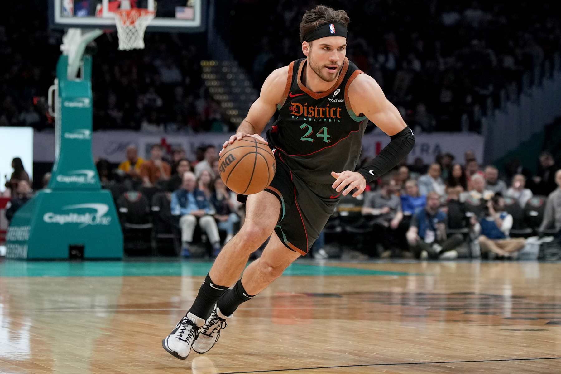 WASHINGTON, DC - APRIL 12: Corey Kispert #24 of the Washington Wizards dribbles to the hoop during the first half against the Chicago Bulls at Capital One Arena on April 12, 2024 in Washington, DC. NOTE TO USER: User expressly acknowledges and agrees that, by downloading and or using this photograph, User is consenting to the terms and conditions of the Getty Images License Agreement. (Photo by Jess Rapfogel/Getty Images)