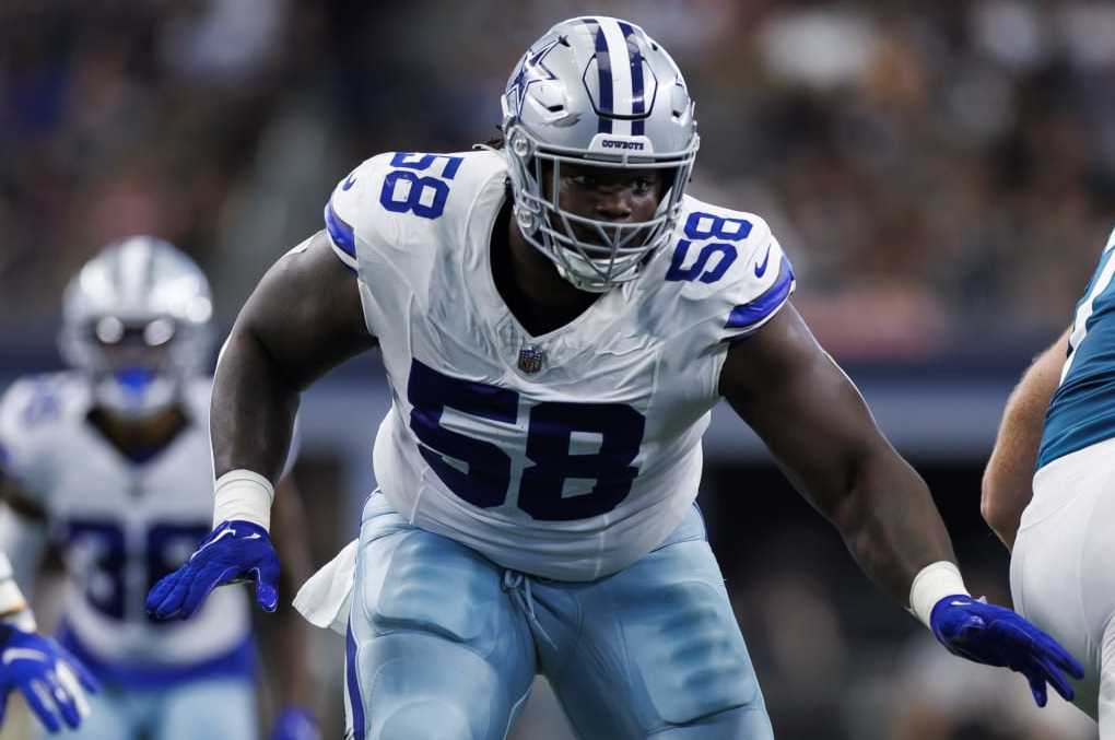 ARLINGTON, TEXAS - AUGUST 12: Mazi Smith #58 of the Dallas Cowboys rushes the line of scrimmage during an NFL preseason football game against the Jacksonville Jaguars at AT&T Stadium on August 12, 2023 in Arlington, Texas. (Photo by Ryan Kang/Getty Images)