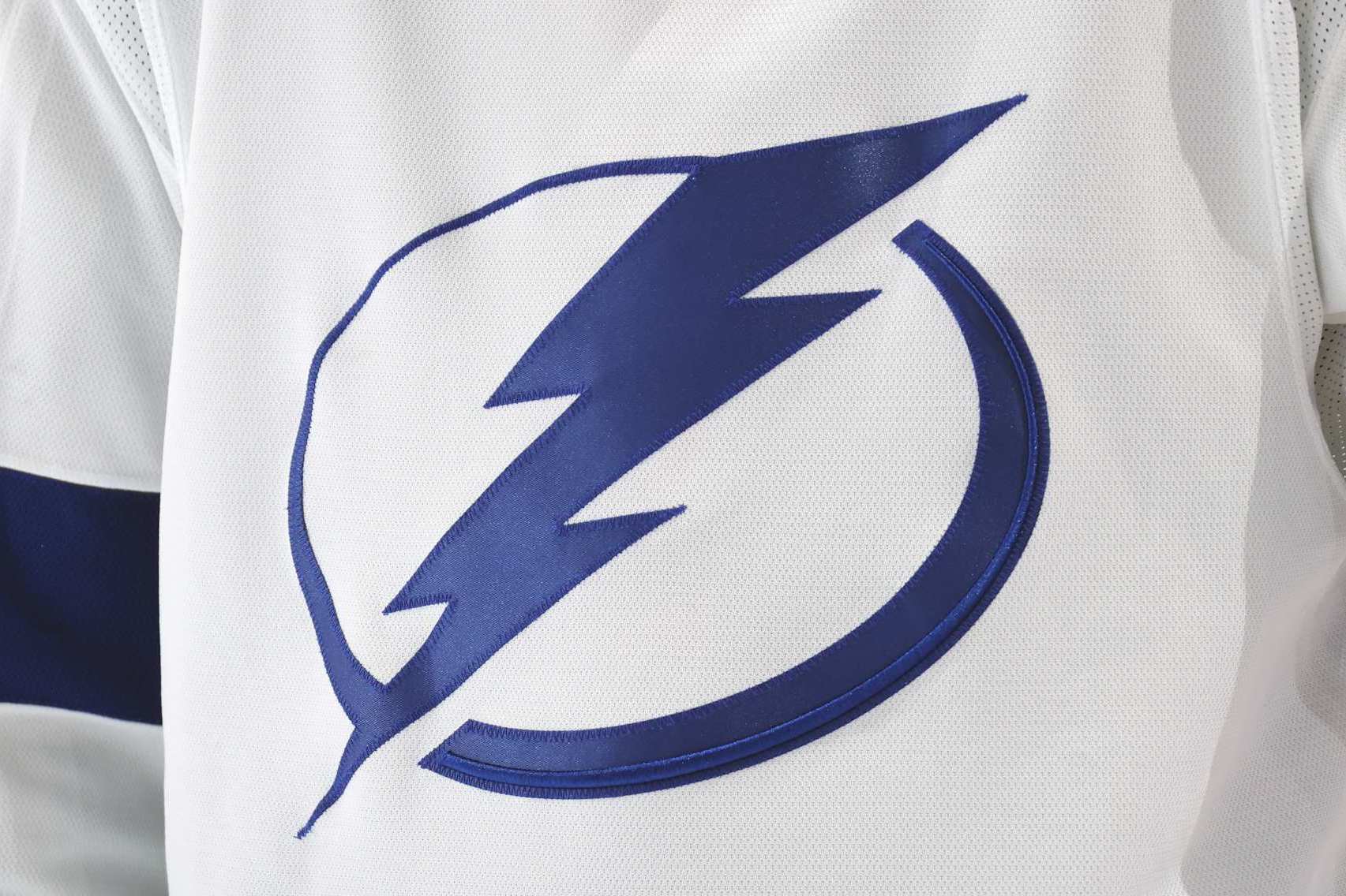 PHILADELPHIA, PENNSYLVANIA - JANUARY 23:  A view of the jersey logo of the Tampa Bay Lightning during an NHL game against the Philadelphia Flyers at the Wells Fargo Center on January 23, 2024 in Philadelphia, Pennsylvania.  (Photo by Len Redkoles/NHLI via Getty Images)