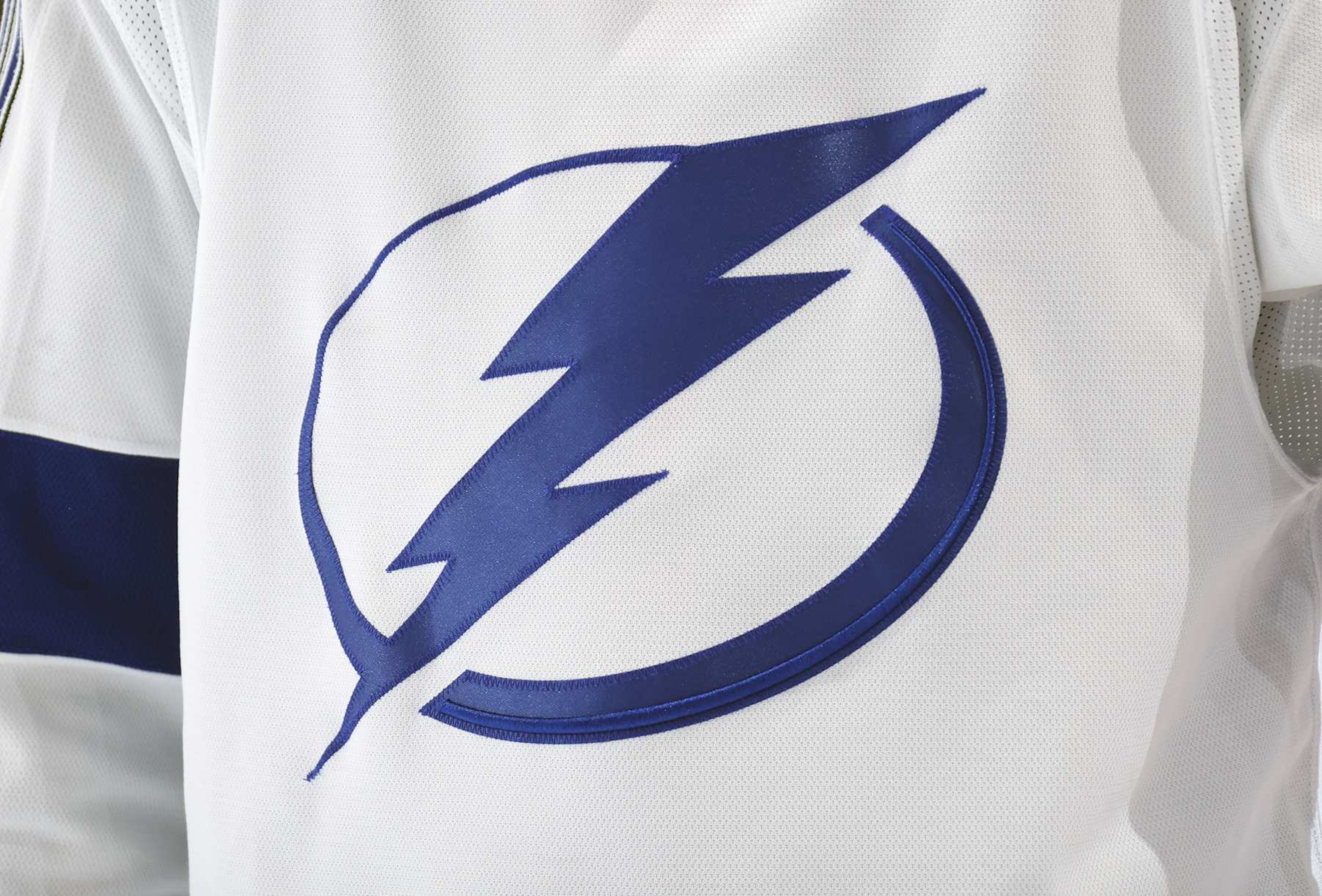 PHILADELPHIA, PENNSYLVANIA - JANUARY 23: A view of the jersey logo of the Tampa Bay Lightning during an NHL game against the Philadelphia Flyers at the Wells Fargo Center on January 23, 2024 in Philadelphia, Pennsylvania. (Photo by Len Redkoles/NHLI via Getty Images) PHILADELPHIA, PENNSYLVANIA - JANUARY 23: A view of the jersey logo of the Tampa Bay Lightning during an NHL game against the Philadelphia Flyers at the Wells Fargo Center on January 23, 2024 in Philadelphia, Pennsylvania. (Photo by Len Redkoles/NHLI via Getty Images)