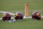 Washington Football Team helmets are seen on the field during an NFL football OTA at Inova Sports Performance Center in Ashburn, Va., Wednesday, June 2, 2021. (AP Photo/Luis M. Alvarez)