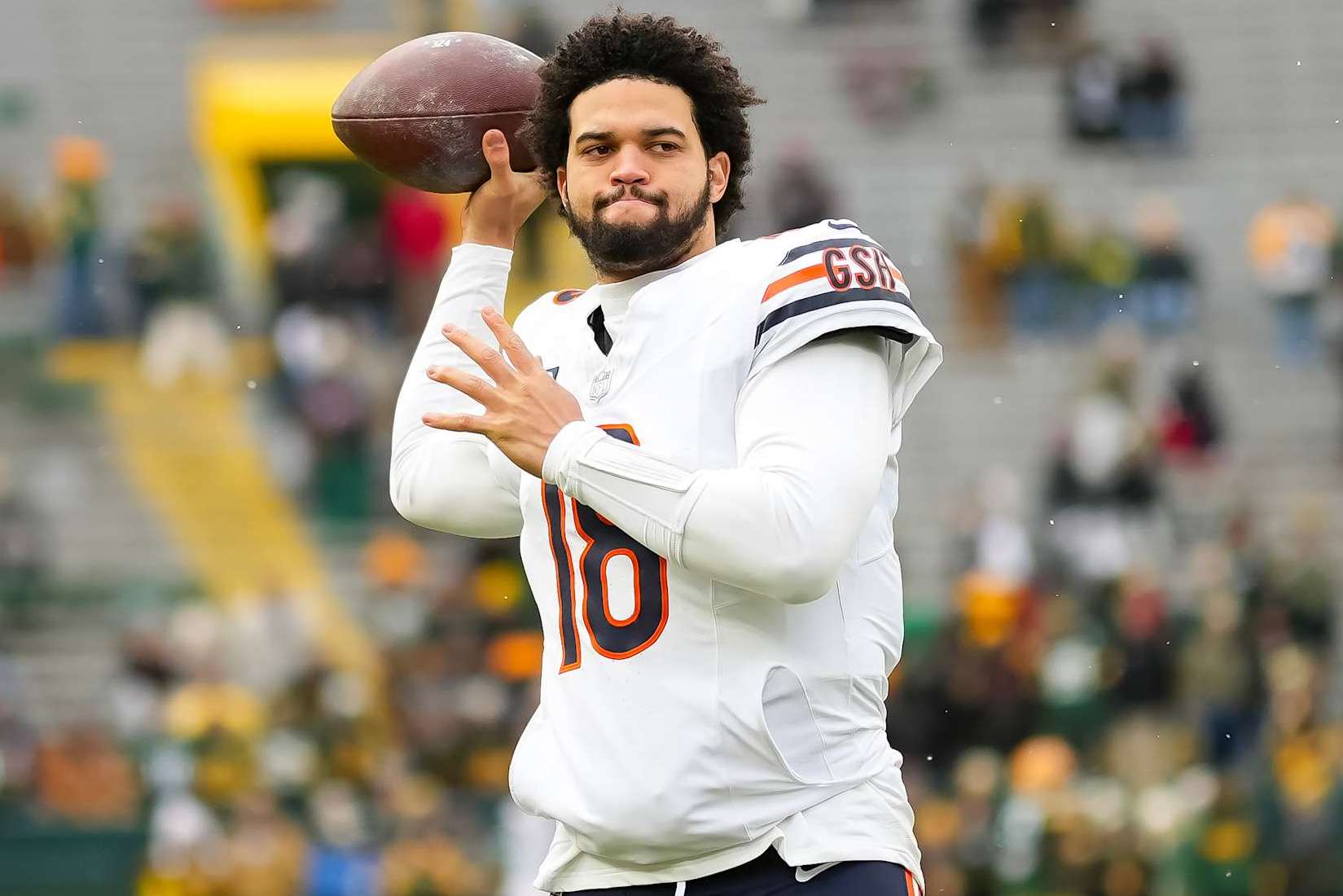 GREEN BAY, WISCONSIN - JANUARY 5: Quarterback Caleb Williams #18 of the Chicago Bears warms up prior to an NFL football game against the Green Bay Packers, at Lambeau Field on January 5, 2025 in Green Bay, Wisconsin. (Photo by Todd Rosenberg/Getty Images)