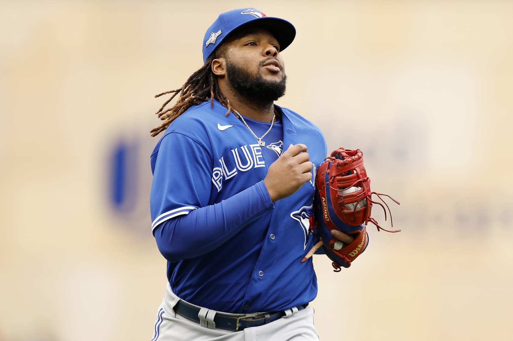 MINNEAPOLIS, MINNESOTA - OCTOBER 04: Vladimir Guerrero Jr. #27 of the Toronto Blue Jays takes the field against the Minnesota Twins during the first inning in Game Two of the Wild Card Series at Target Field on October 04, 2023 in Minneapolis, Minnesota. (Photo by David Berding/Getty Images)
