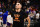 PHOENIX, AZ - NOVEMBER 30: Devin Booker #1 of the Phoenix Suns looks on before the game against the Golden State Warriors on November 30, 2021 at Footprint Center in Phoenix, Arizona. NOTE TO USER: User expressly acknowledges and agrees that, by downloading and or using this photograph, user is consenting to the terms and conditions of the Getty Images License Agreement. Mandatory Copyright Notice: Copyright 2021 NBAE (Photo by Barry Gossage/NBAE via Getty Images)