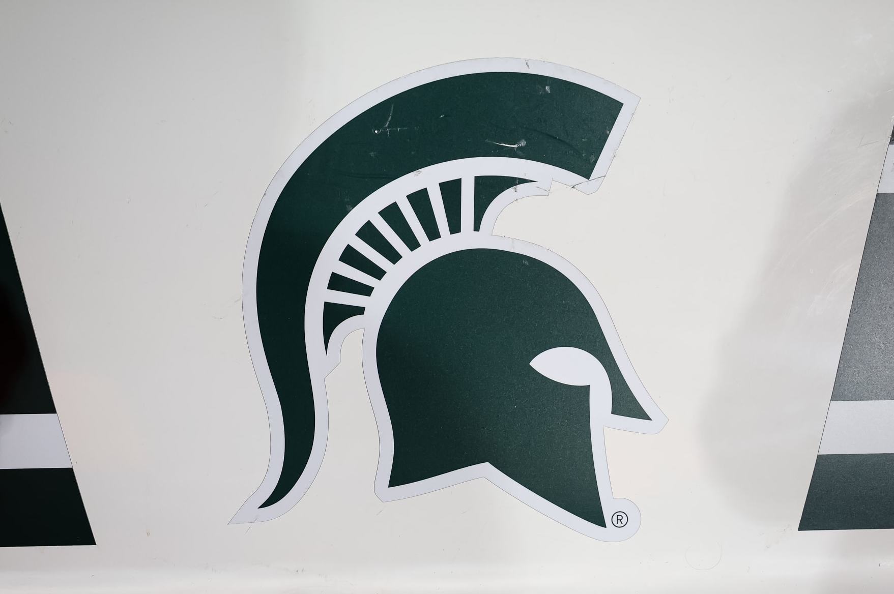 STATE COLLEGE, PA - NOVEMBER 26: A general view of the Michigan State logo on the players bench after the game between the Penn State Nittany Lions and the Michigan State Spartans at Beaver Stadium on November 26, 2022 in State College, Pennsylvania. (Photo by Scott Taetsch/Getty Images)