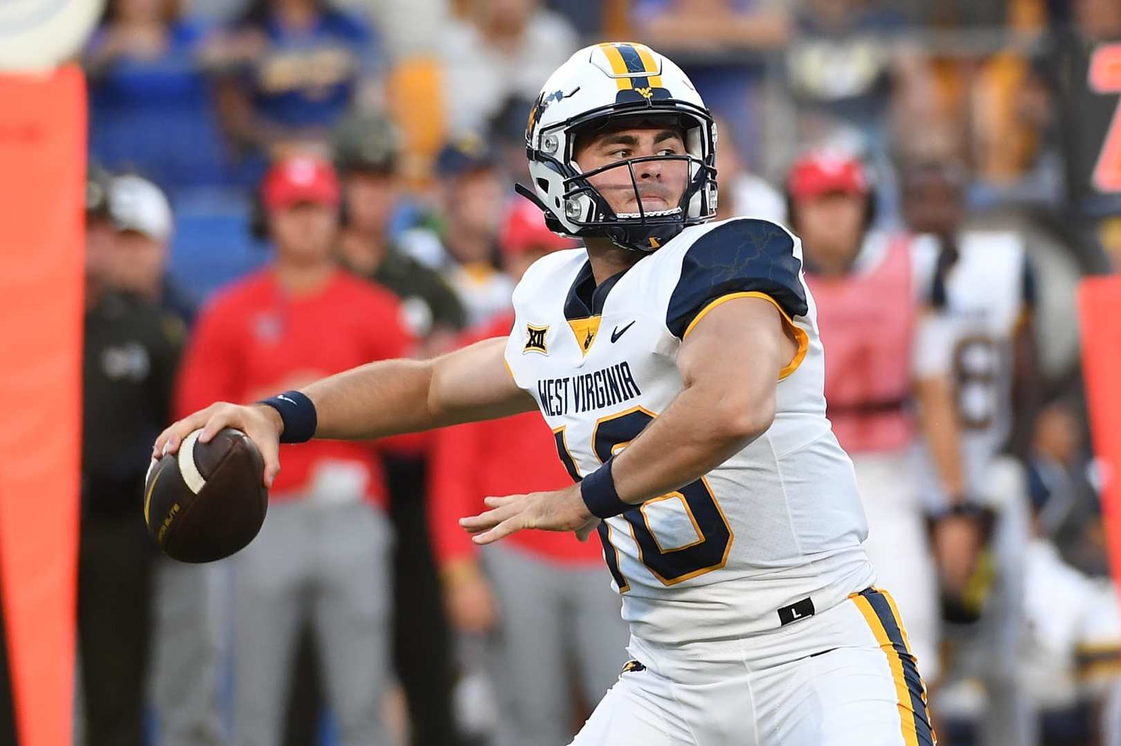 PITTSBURGH, PA - SEPTEMBER 01: JT Daniels #18 of the West Virginia Mountaineers drops back to pass in the first quarter during the game against the Pittsburgh Panthers at Acrisure Stadium on September 1, 2022 in Pittsburgh, Pennsylvania. (Photo by Justin Berl/Getty Images)