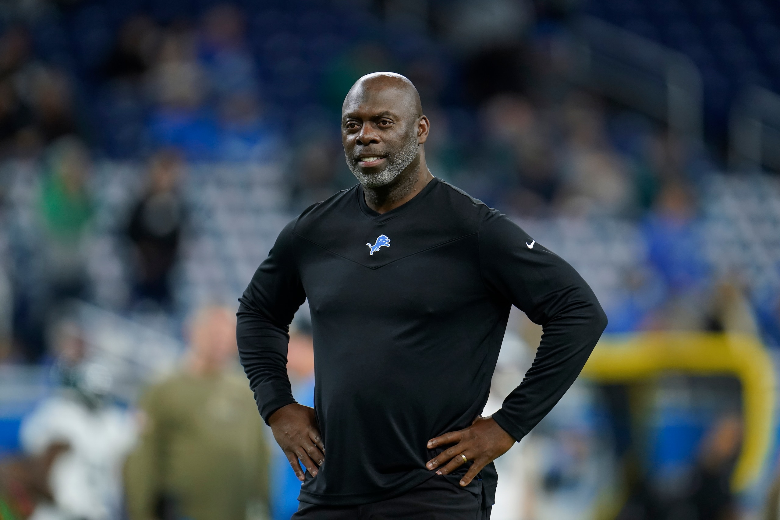 Anthony Lynn, Detroit Lions Offensive Coordinator, watches during warmups before an NFL football game against the Philadelphia Eagles in Detroit, Sunday, Oct. 31, 2021. (AP Photo/Paul Sancya)
