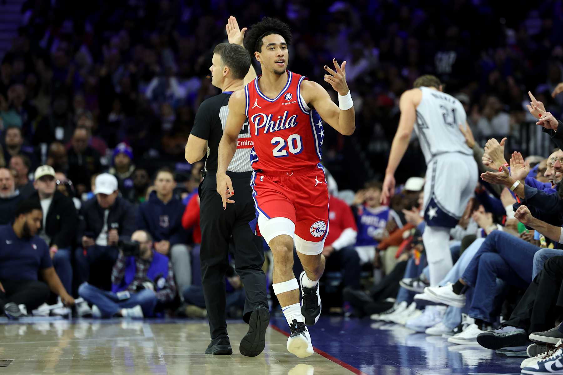 PHILADELPHIA, PENNSYLVANIA - DECEMBER 06: Jared McCain #20 of the Philadelphia 76ers celebrates a three-pointer against the Orlando Magic during the second half at the Wells Fargo Center on December 06, 2024 in Philadelphia, Pennsylvania. NOTE TO USER: User expressly acknowledges and agrees that, by downloading and or using this photograph, User is consenting to the terms and conditions of the Getty Images License Agreement. (Photo by Emilee Chinn/Getty Images)