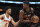 MIAMI, FLORIDA - MARCH 25: Jimmy Butler #22 of the Miami Heat posts up Quentin Grimes #6 of the New York Knicks during the second half at FTX Arena on March 25, 2022 in Miami, Florida.NOTE TO USER: User expressly acknowledges and agrees that,  by downloading and or using this photograph,  User is consenting to the terms and conditions of the Getty Images License Agreement. (Photo by Eric Espada/Getty Images)