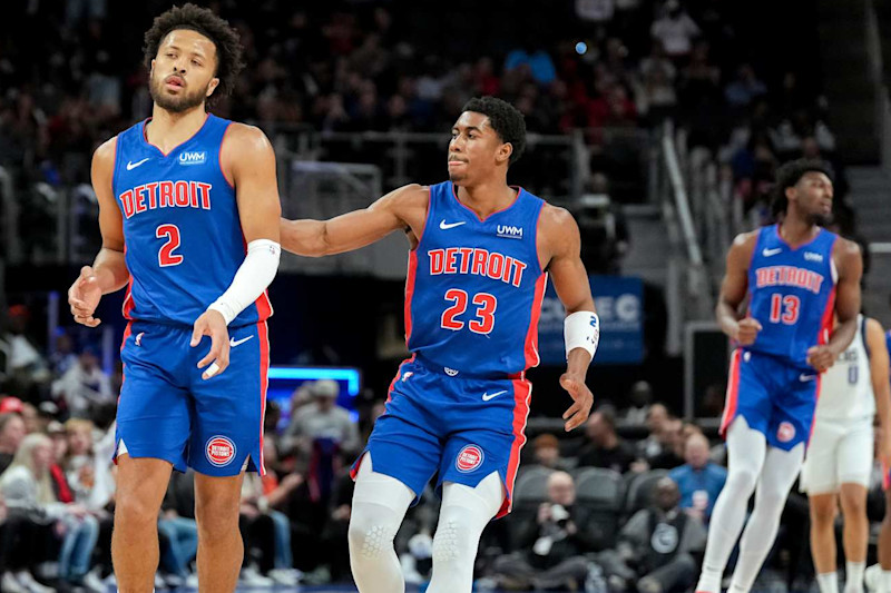 DETROIT, MICHIGAN - MARCH 09: Jaden Ivey #23 of the Detroit Pistons pats Cade Cunningham #2 of the Detroit Pistons on the back after Cunningham made a basket against the Dallas Mavericks during the first quarter at Little Caesars Arena on March 09, 2024 in Detroit, Michigan. NOTE TO USER: User expressly acknowledges and agrees that, by downloading and or using this photograph, User is consenting to the terms and conditions of the Getty Images License Agreement. (Photo by Nic Antaya/Getty Images)