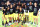 PALMETTO, FL - OCTOBER 6:  The Seattle Storm pose for a team photo with the trophy after winning the 2020 WNBA Championship in Game Three of the WNBA Finals against the Las Vegas Aces on October 6, 2020 at Feld Entertainment Center in Palmetto, Florida. NOTE TO USER: User expressly acknowledges and agrees that, by downloading and/or using this Photograph, user is consenting to the terms and conditions of the Getty Images License Agreement. Mandatory Copyright Notice: Copyright 2020 NBAE (Photo by Ned Dishman/NBAE via Getty Images)