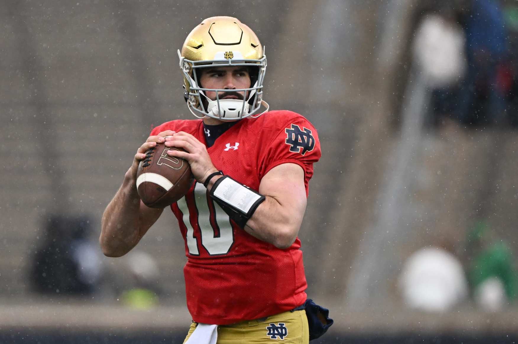 SOUTH BEND, INDIANA - APRIL 22: Sam Hartman #10 of the Notre Dame Fighting Irish warms up before the Notre Dame Blue-Gold Spring Football Game at Notre Dame Stadium on April 22, 2023 in South Bend, Indiana. (Photo by Quinn Harris/Getty Images)
