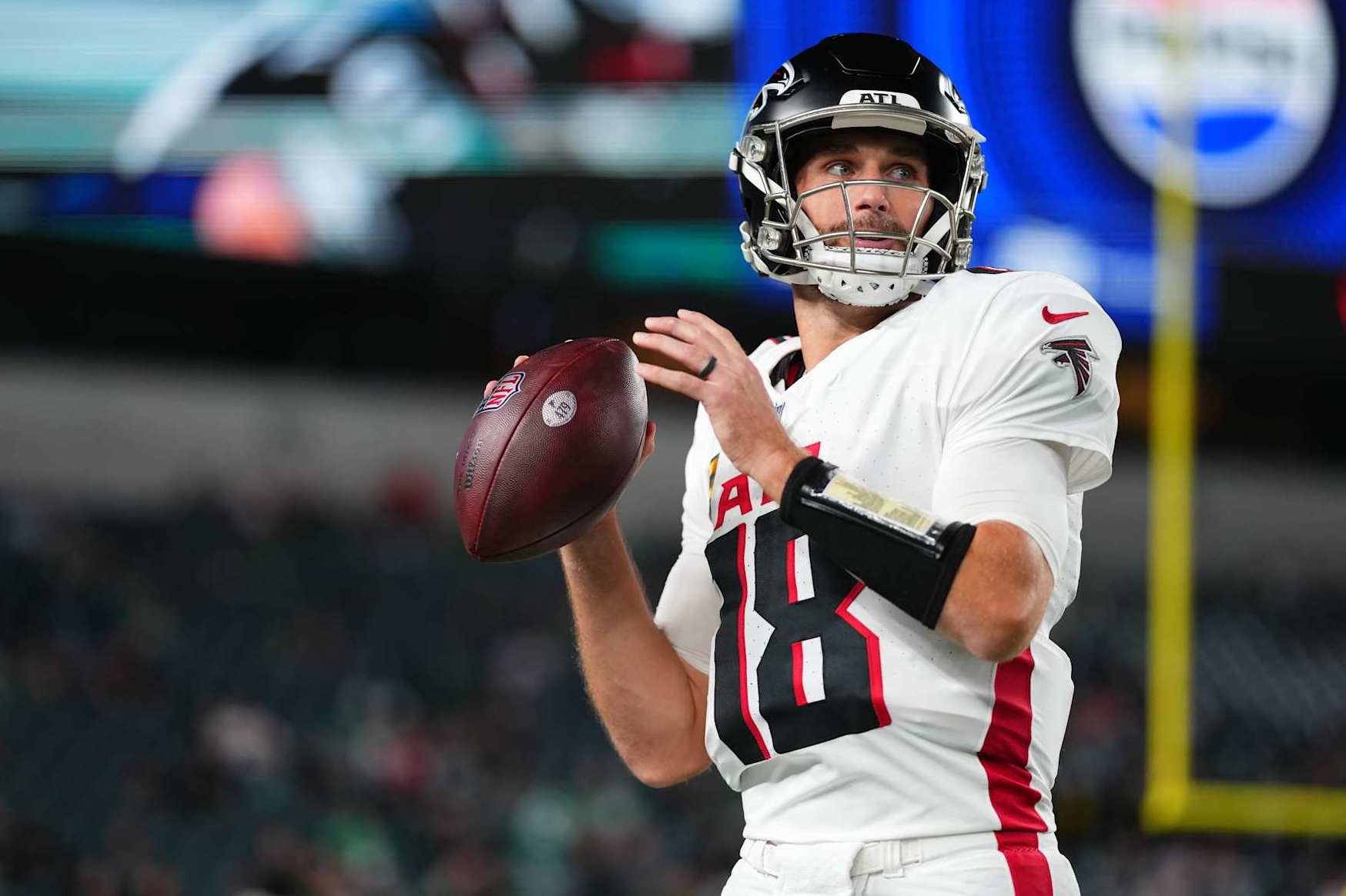 PHILADELPHIA, PA - SEPTEMBER 16: Kirk Cousins #18 of the Atlanta Falcons warms up before kickoff against the Philadelphia Eagles during a football game at Lincoln Financial Field on September 16, 2024 in Philadelphia, Pennsylvania. (Photo by Cooper Neill/Getty Images)