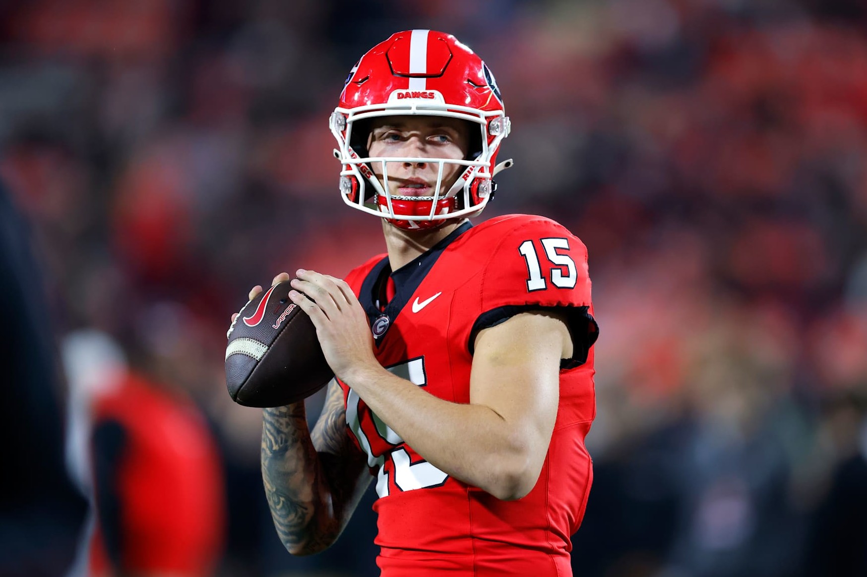 ATHENS, GEORGIA - NOVEMBER 16: Carson Beck #15 of the Georgia Bulldogs warms up prior to a game against the Tennessee Volunteers at Sanford Stadium on November 16, 2024 in Athens, Georgia. (Photo by Todd Kirkland/Getty Images)