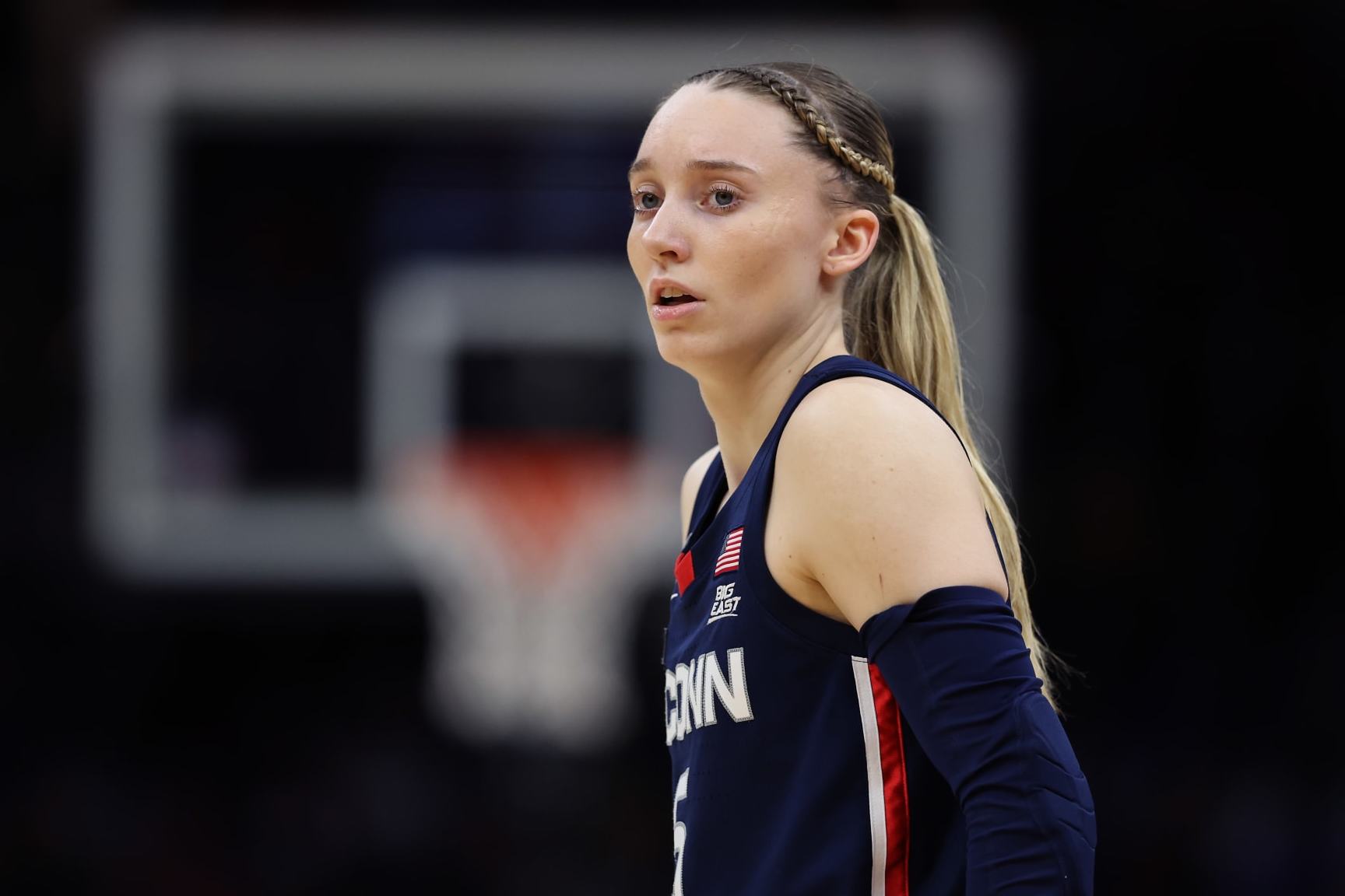 CLEVELAND, OHIO - APRIL 05: Paige Bueckers #5 of the UConn Huskies looks on during the NCAA Women's Basketball Tournament Final Four semifinal game against the Iowa Hawkeyes at Rocket Mortgage Fieldhouse on April 05, 2024 in Cleveland, Ohio. (Photo by Steph Chambers/Getty Images)