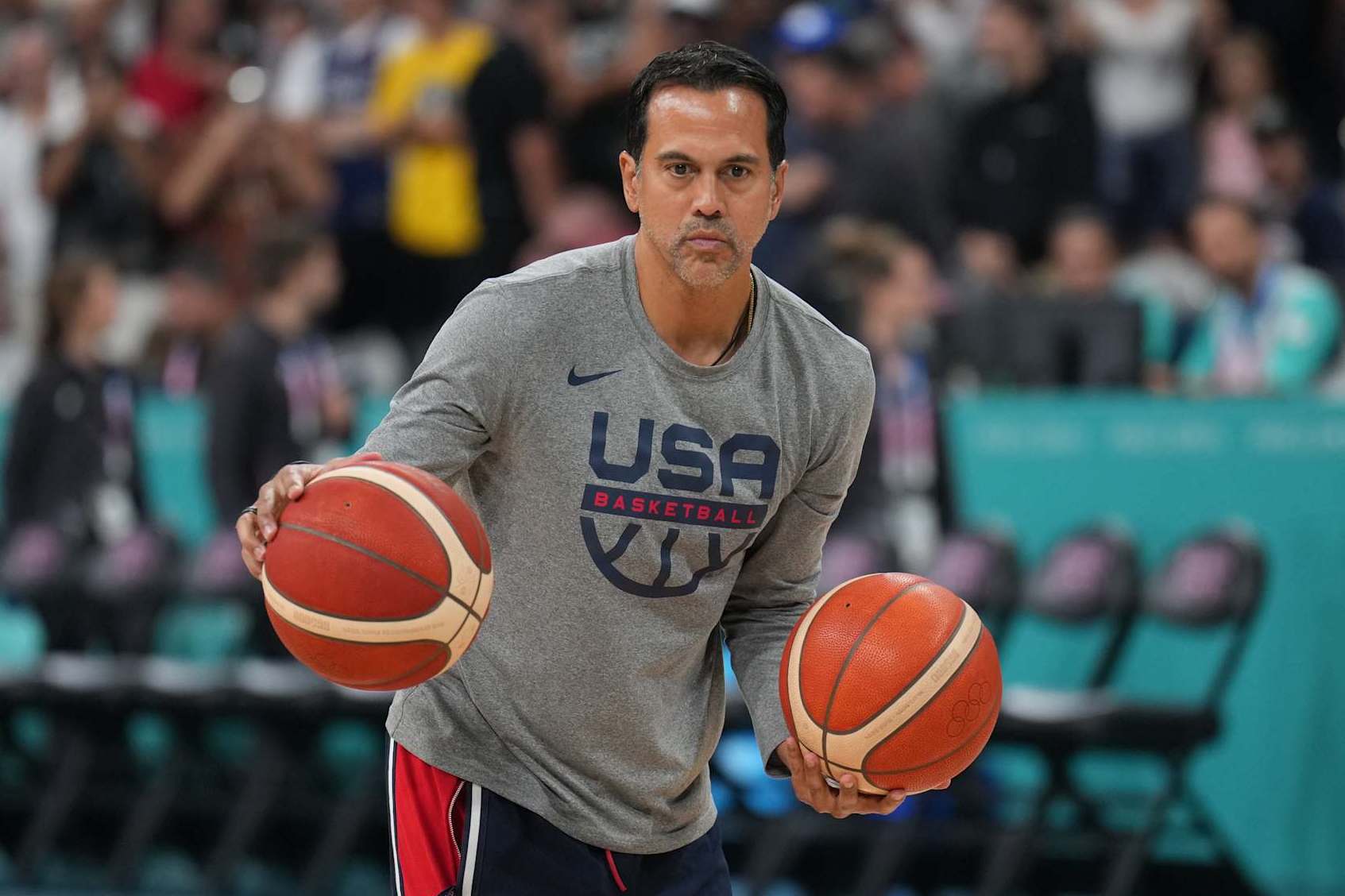 LILLE, FRANCE - JULY 31: Assistant Coach Erik Spoelstra of the USA Basketball Men's Team passes the ball before the game on July 31, 2024 at the Stade Pierre Mauroy in Paris, France. NOTE TO USER: User expressly acknowledges and agrees that, by downloading and/or using this photograph, user is consenting to the terms and conditions of the Getty Images License Agreement. Mandatory Copyright Notice: Copyright 2024 NBAE (Photo by Jesse D. Garrabrant/NBAE via Getty Images)