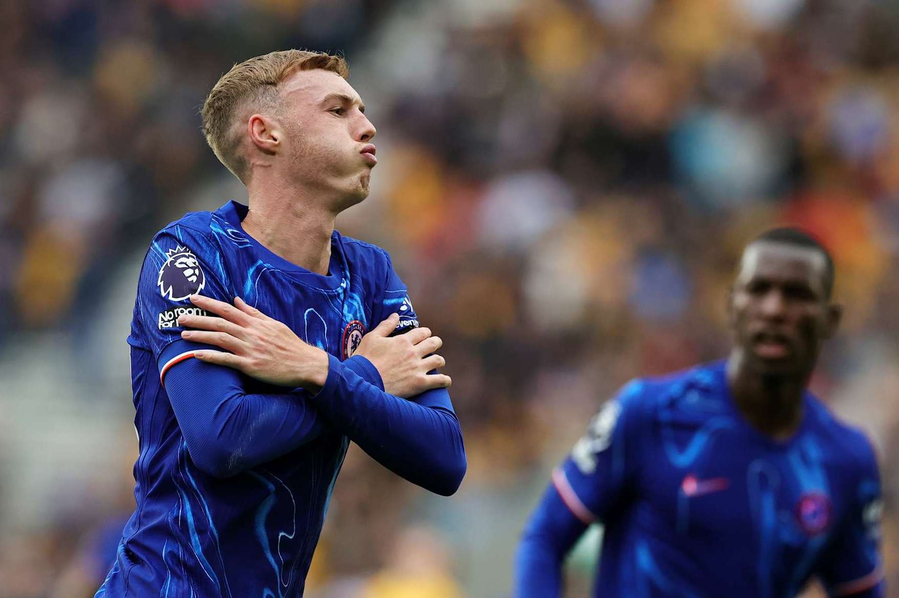 WOLVERHAMPTON, ENGLAND - AUGUST 25: Cole Palmer of Chelsea celebrates scoring his team's second goal during the Premier League match between Wolverhampton Wanderers FC and Chelsea FC at Molineux on August 25, 2024 in Wolverhampton, England. (Photo by David Rogers/Getty Images)