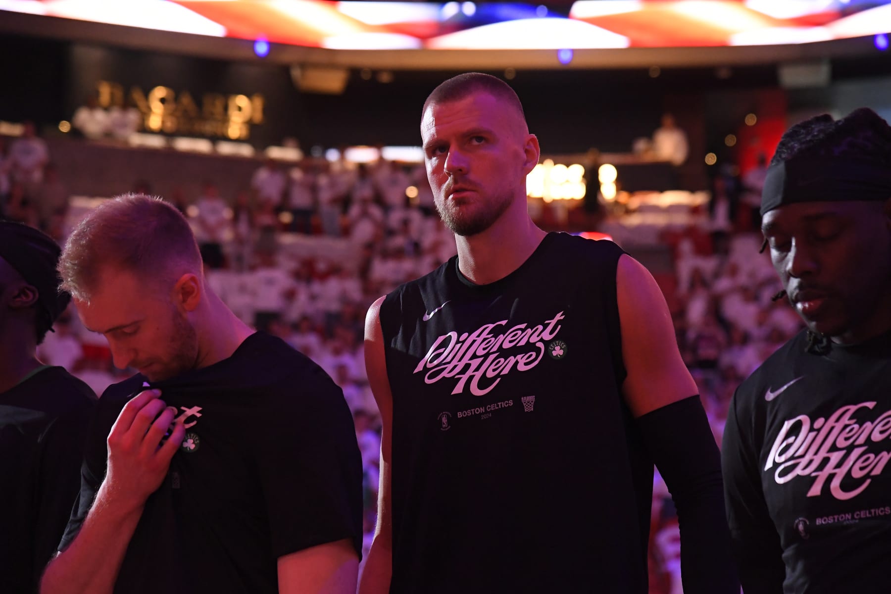 MIAMI, FL - APRIL 27: Kristaps Porzingis #8 of the Boston Celtics stands for the National Anthem before the game  against the Miami Heat  during Round 1 Game 3 of the 2024 NBA Playoffs on April 27, 2024 at Kaseya Center in Miami, Florida. NOTE TO USER: User expressly acknowledges and agrees that, by downloading and or using this Photograph, user is consenting to the terms and conditions of the Getty Images License Agreement. Mandatory Copyright Notice: Copyright 2024 NBAE (Photo by Brian Babineau/NBAE via Getty Images)