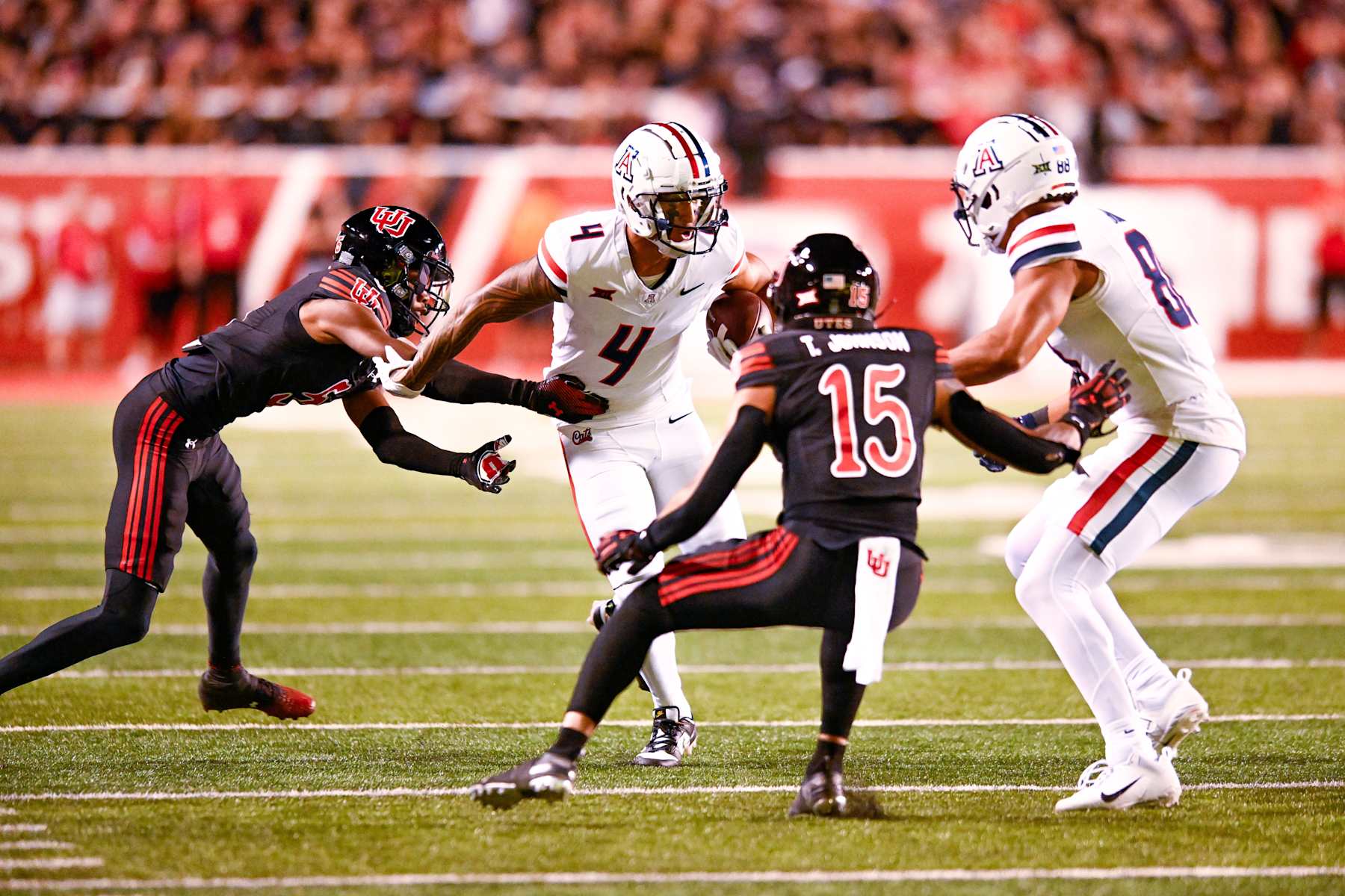 SALT LAKE CITY, UT - SEPTEMBER 28: Arizona Wildcats wide receiver Tetairoa McMillan (4) runs after a catch during a college football game between the Arizona Wildcats and Utah Utes on September 28, 2024 at Rice Eccles Stadium at Salt Lake City, Utah. (Photo by Boyd Ivey/Icon Sportswire via Getty Images)