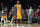 FILE - In this Tuesday, April 11, 2017, file photo, Los Angeles Lakers forward Metta World Peace stands on the court while teammates and fans cheer as the 24-second clock runs out near the end of the team's 108-96 victory against the New Orleans Pelicans in an NBA basketball game in Los Angeles. Metta World Peace needed to win a championship ring so his career wasn't defined only by one angry moment in Detroit. (AP Photo/Mark J. Terrill, File)