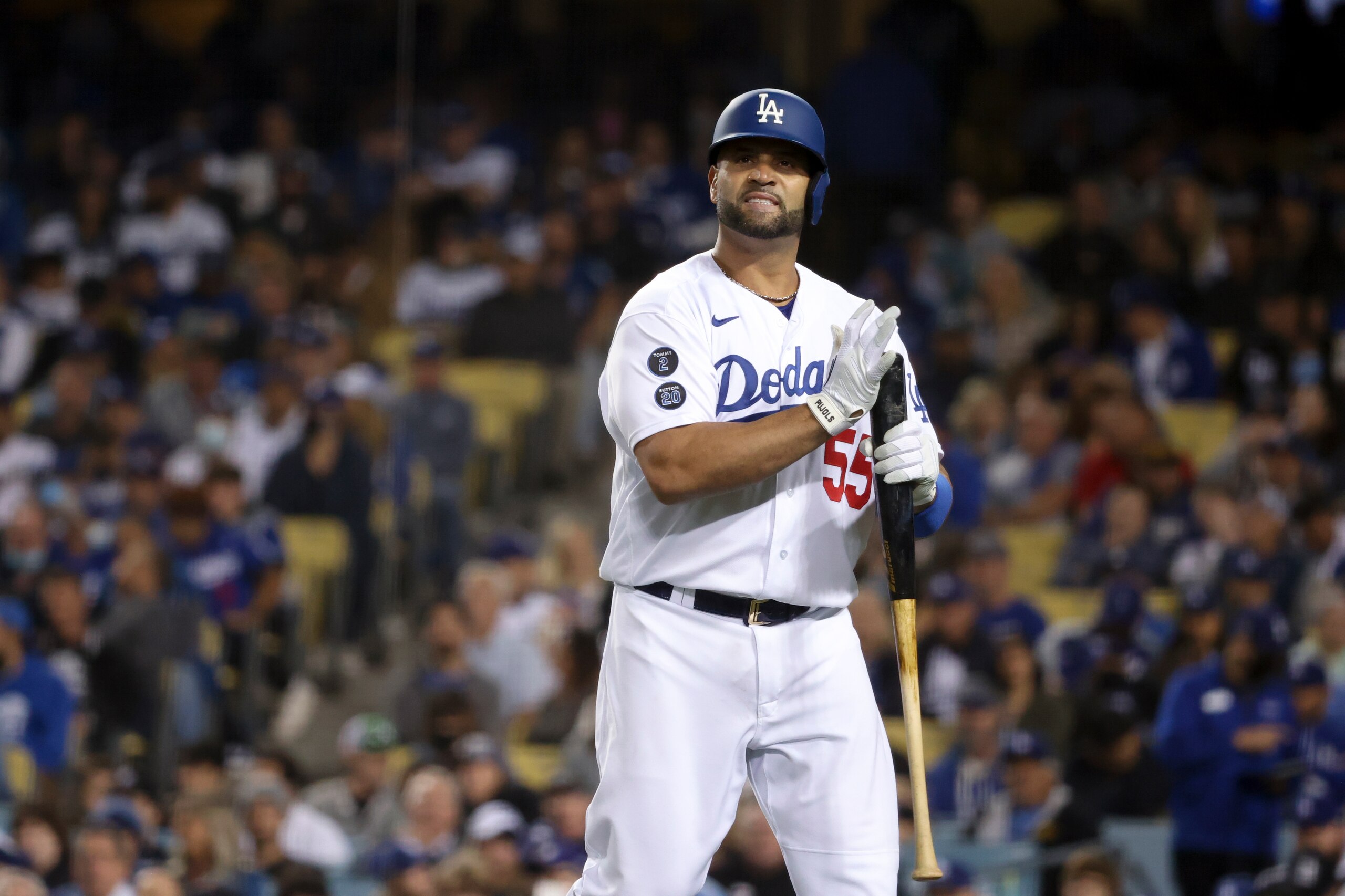 Los Angeles, CA - October 21: Los Angeles Dodgers' Albert Pujols reacts after striking out during the seventh inning in game five in the 2021 National League Championship Series against the Atlanta Braves at Dodger Stadium on Thursday, Oct. 21, 2021 in Los Angeles, CA. (Robert Gauthier / Los Angeles Times via Getty Images) Los Angeles, CA - October 21: Los Angeles Dodgers' Albert Pujols reacts after striking out during the seventh inning in game five in the 2021 National League Championship Series against the Atlanta Braves at Dodger Stadium on Thursday, Oct. 21, 2021 in Los Angeles, CA. (Robert Gauthier / Los Angeles Times via Getty Images)