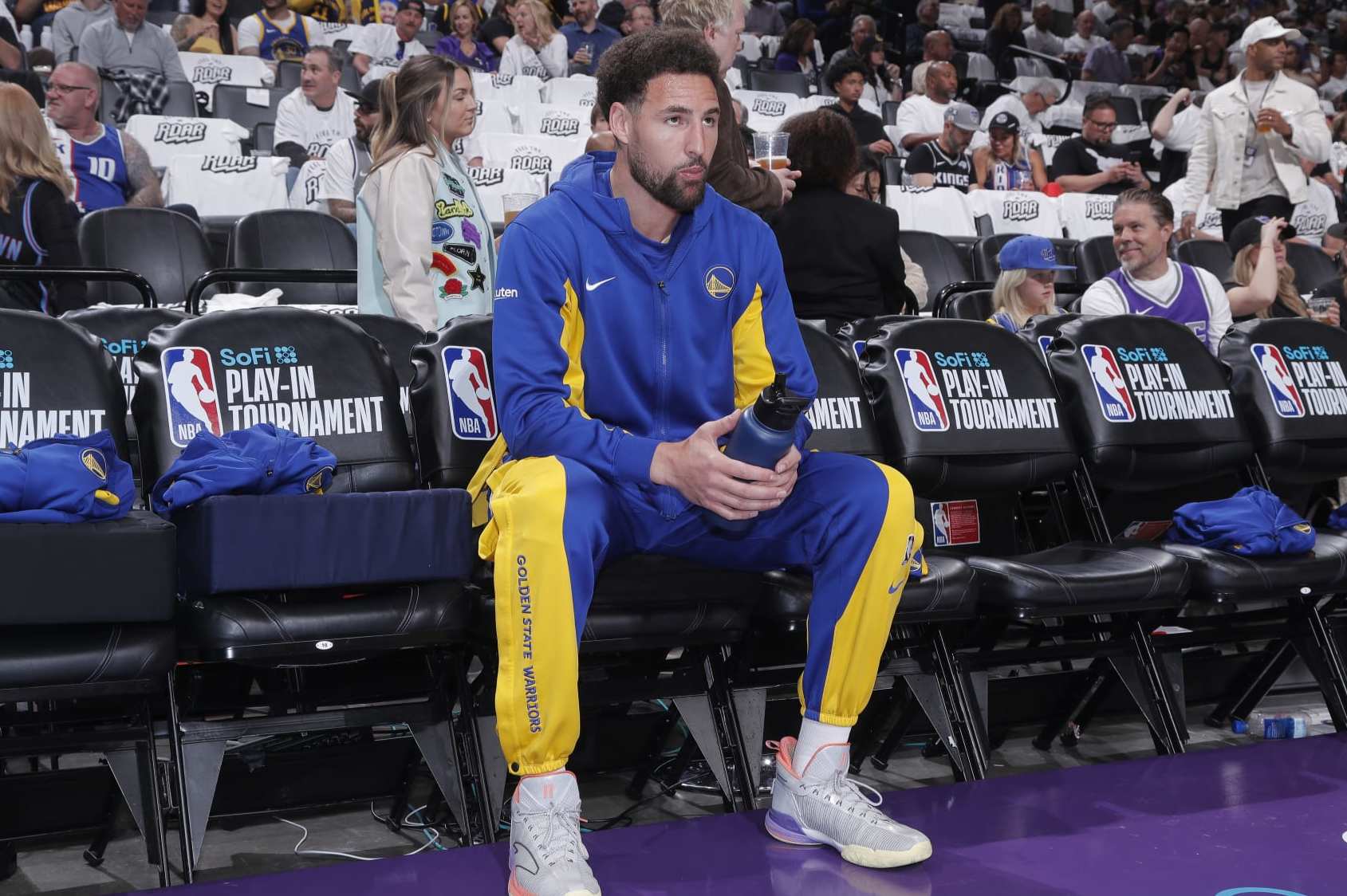 SACRAMENTO, CA - APRIL 16: Klay Thompson #11 of the Golden State Warriors looks on from the bench prior to the game against the Sacramento Kings during the 2024 Play-In Tournament on April 16, 2024 at Golden 1 Center in Sacramento, California. NOTE TO USER: User expressly acknowledges and agrees that, by downloading and or using this photograph, User is consenting to the terms and conditions of the Getty Images Agreement. Mandatory Copyright Notice: Copyright 2024 NBAE (Photo by Rocky Widner/NBAE via Getty Images)