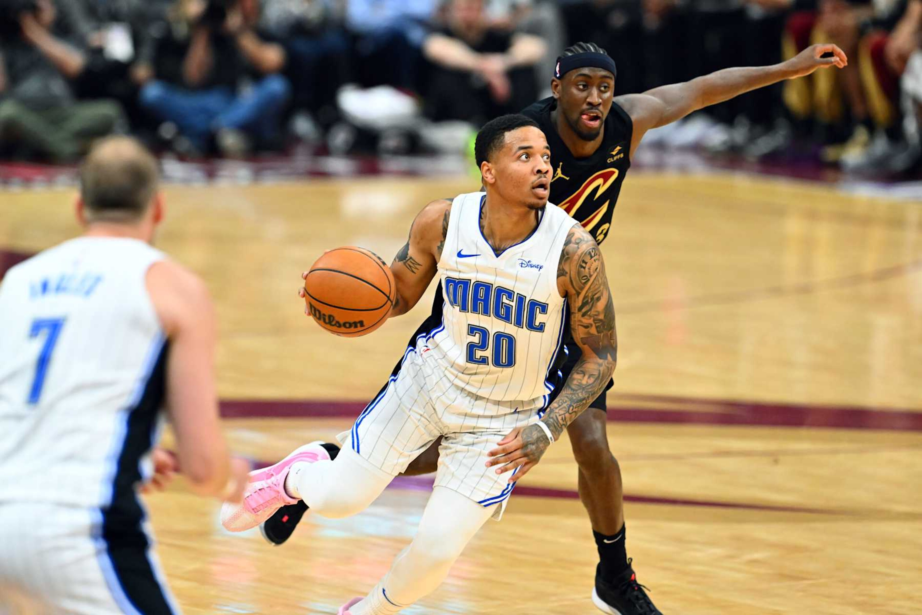 CLEVELAND, OHIO - APRIL 30: Markelle Fultz #20 of the Orlando Magic drives to the basket around Caris LeVert #3 of the Cleveland Cavaliers during the second quarter of game five of the Eastern Conference First Round Playoffs at Rocket Mortgage Fieldhouse on April 30, 2024 in Cleveland, Ohio. NOTE TO USER: User expressly acknowledges and agrees that, by downloading and or using this photograph, User is consenting to the terms and conditions of the Getty Images License Agreement. (Photo by Jason Miller/Getty Images) CLEVELAND, OHIO - APRIL 30: Markelle Fultz #20 of the Orlando Magic drives to the basket around Caris LeVert #3 of the Cleveland Cavaliers during the second quarter of game five of the Eastern Conference First Round Playoffs at Rocket Mortgage Fieldhouse on April 30, 2024 in Cleveland, Ohio. NOTE TO USER: User expressly acknowledges and agrees that, by downloading and or using this photograph, User is consenting to the terms and conditions of the Getty Images License Agreement. (Photo by Jason Miller/Getty Images)