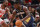 CHICAGO, ILLINOIS - OCTOBER 04: Zion Williamson #1 of the New Orleans Pelicans drives to the basket against Patrick Williams #44 of the Chicago Bulls during the first half of a preseason game at the United Center on October 04, 2022 in Chicago, Illinois.NOTE TO USER: User expressly acknowledges and agrees that, by downloading and or using this photograph, User is consenting to the terms and conditions of the Getty Images License Agreement. (Photo by Michael Reaves/Getty Images)