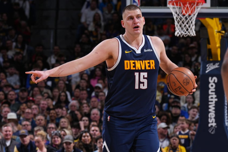 DENVER, CO - MARCH 11: Nikola Jokic #15 of the Denver Nuggets handles the ball during the game against the Toronto Raptors on March 11, 2024 at the Ball Arena in Denver, Colorado. NOTE TO USER: User expressly acknowledges and agrees that, by downloading and/or using this Photograph, user is consenting to the terms and conditions of the Getty Images License Agreement. Mandatory Copyright Notice: Copyright 2024 NBAE (Photo by Garrett Ellwood/NBAE via Getty Images)