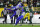 GREEN BAY, WISCONSIN - NOVEMBER 28: Nick Scott #33 and Donte' Deayon #21 of the Los Angeles Rams defend a pass intended for Equanimeous St. Brown #19 of the Green Bay Packers during a game at Lambeau Field on November 28, 2021 in Green Bay, Wisconsin.  The Packers defeated the Rams 36-28.   (Photo by Stacy Revere/Getty Images)