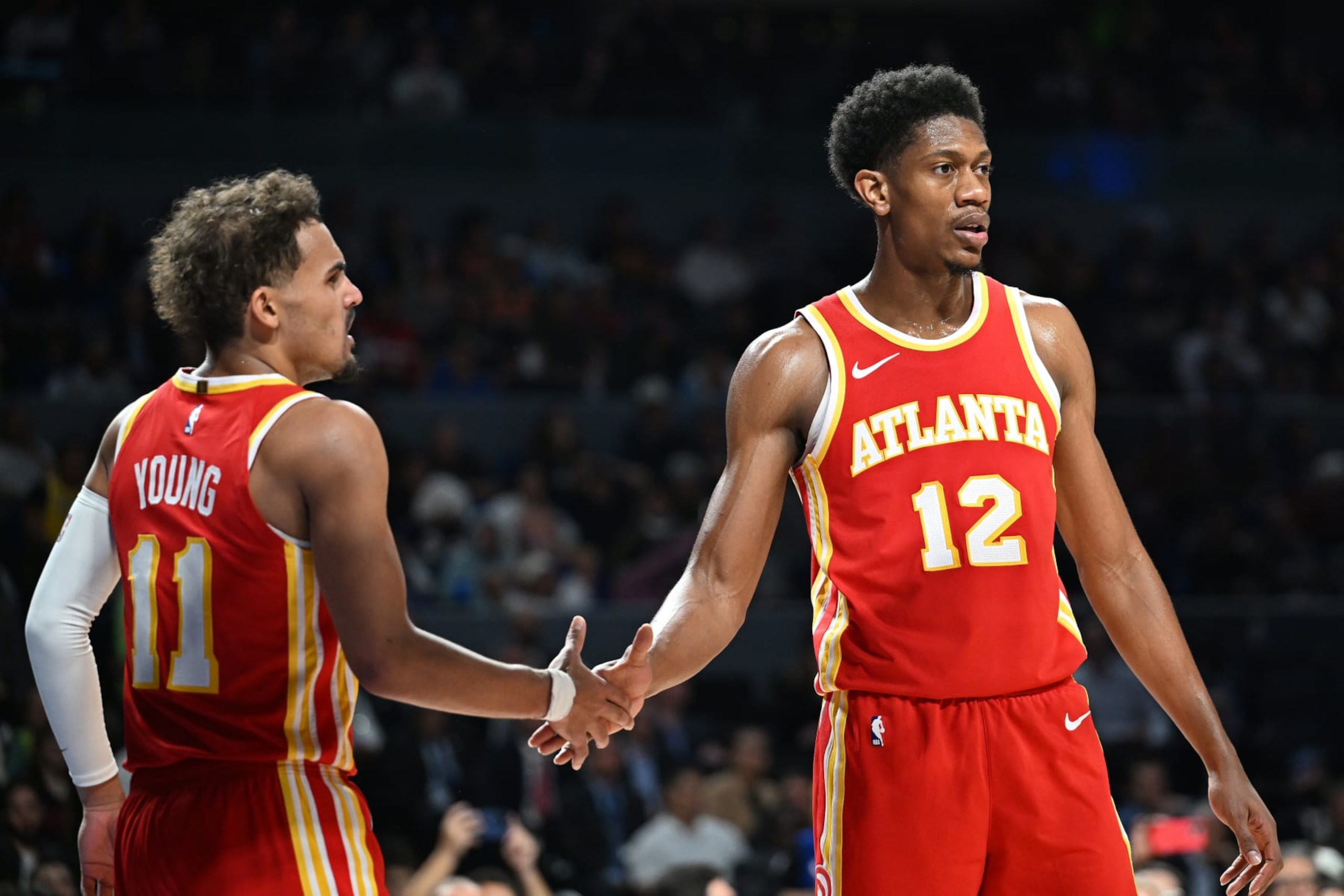 MEXICO CITY, MX - NOVEMBER 9: Trae Young #11 and De'Andre Hunter #12 of the Atlanta Hawks high five during the game against the Orlando Magic as part of 2023 NBA Mexico Games on November 9, 2023 at Arena Ciudad de Mexico in Mexico City, Mexico. NOTE TO USER: User expressly acknowledges and agrees that, by downloading and or using this photograph, User is consenting to the terms and conditions of the Getty Images License Agreement. Mandatory Copyright Notice: Copyright 2023 NBAE (Photo by Adam Hagy/NBAE via Getty Images)