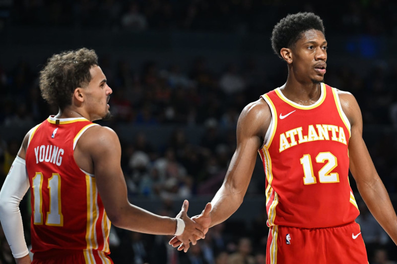 MEXICO CITY, MX - NOVEMBER 9: Trae Young #11 and De'Andre Hunter #12 of the Atlanta Hawks high five during the game against the Orlando Magic as part of 2023 NBA Mexico Games on November 9, 2023 at Arena Ciudad de Mexico in Mexico City, Mexico. NOTE TO USER: User expressly acknowledges and agrees that, by downloading and or using this photograph, User is consenting to the terms and conditions of the Getty Images License Agreement. Mandatory Copyright Notice: Copyright 2023 NBAE (Photo by Adam Hagy/NBAE via Getty Images)