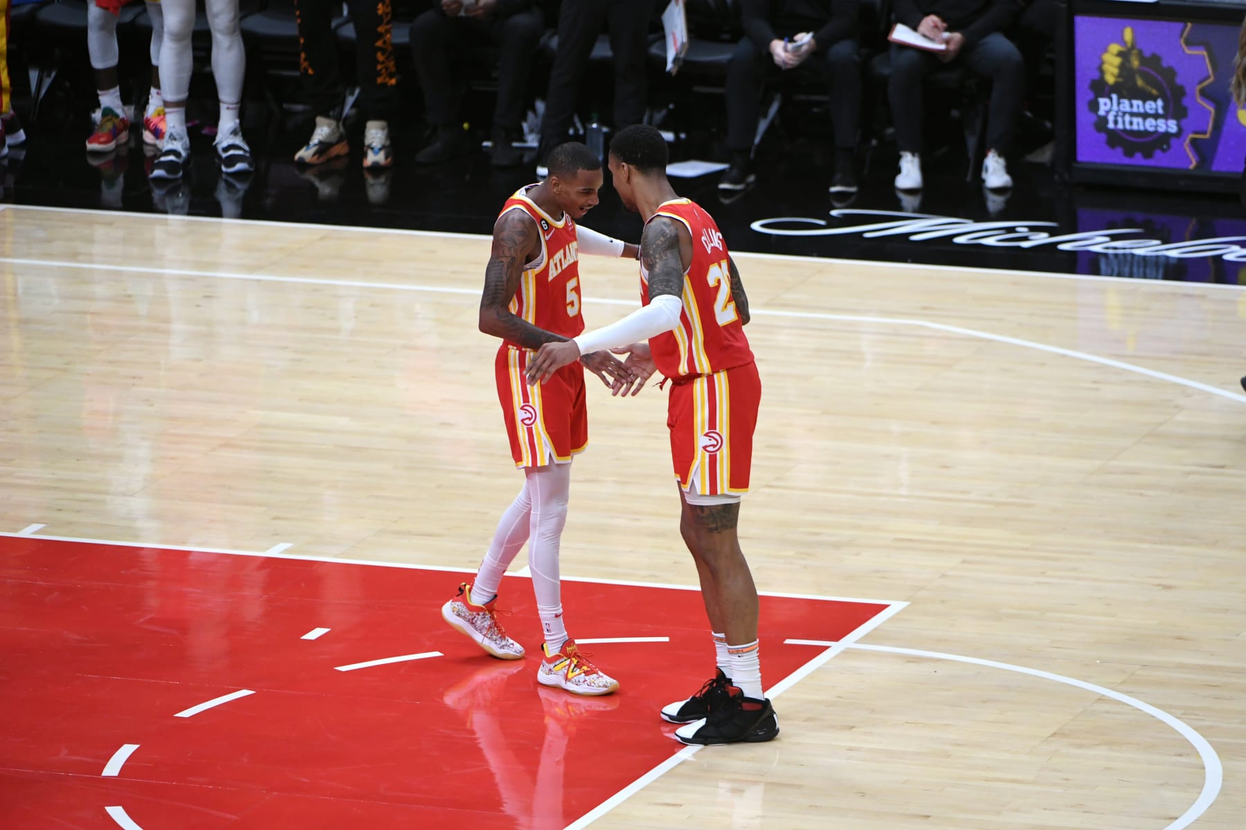 ATLANTA, GA - OCTOBER 19: Dejounte Murray #5 talks to John Collins #20 of the Atlanta Hawks during the game against the Houston Rockets on October 19, 2022 at State Farm Arena in Atlanta, Georgia. NOTE TO USER: User expressly acknowledges and agrees that, by downloading and/or using this Photograph, user is consenting to the terms and conditions of the Getty Images License Agreement. Mandatory Copyright Notice: Copyright 2022 NBAE (Photo by Scott Cunningham/NBAE via Getty Images)