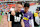 BANGKOK, THAILAND - JULY 23: Jamie Vardy of Leicester City and Son Heung-Min of Tottenham Hotspur during a lap of the pitch to thank fans and mascots for their support after the pre-season friendly match between Tottenham Hotspur and Leicester City at Rajamangala Stadium was cancelled on July 23, 2023 in Bangkok, Thailand. The match was cancelled due to weather conditions. (Photo by Plumb Images/Leicester City FC via Getty Images)
