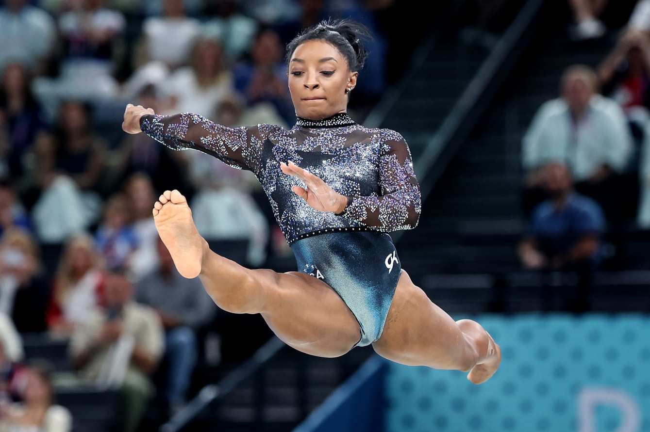 PARIS, FRANCE July 28, 2024-USA's Simone Biles competes on the beam during qualifying for women's team gymnastics at the 2024 Olympics in Paris, France Sunday(Wally Skalij/Los Angeles Times via Getty Images)
