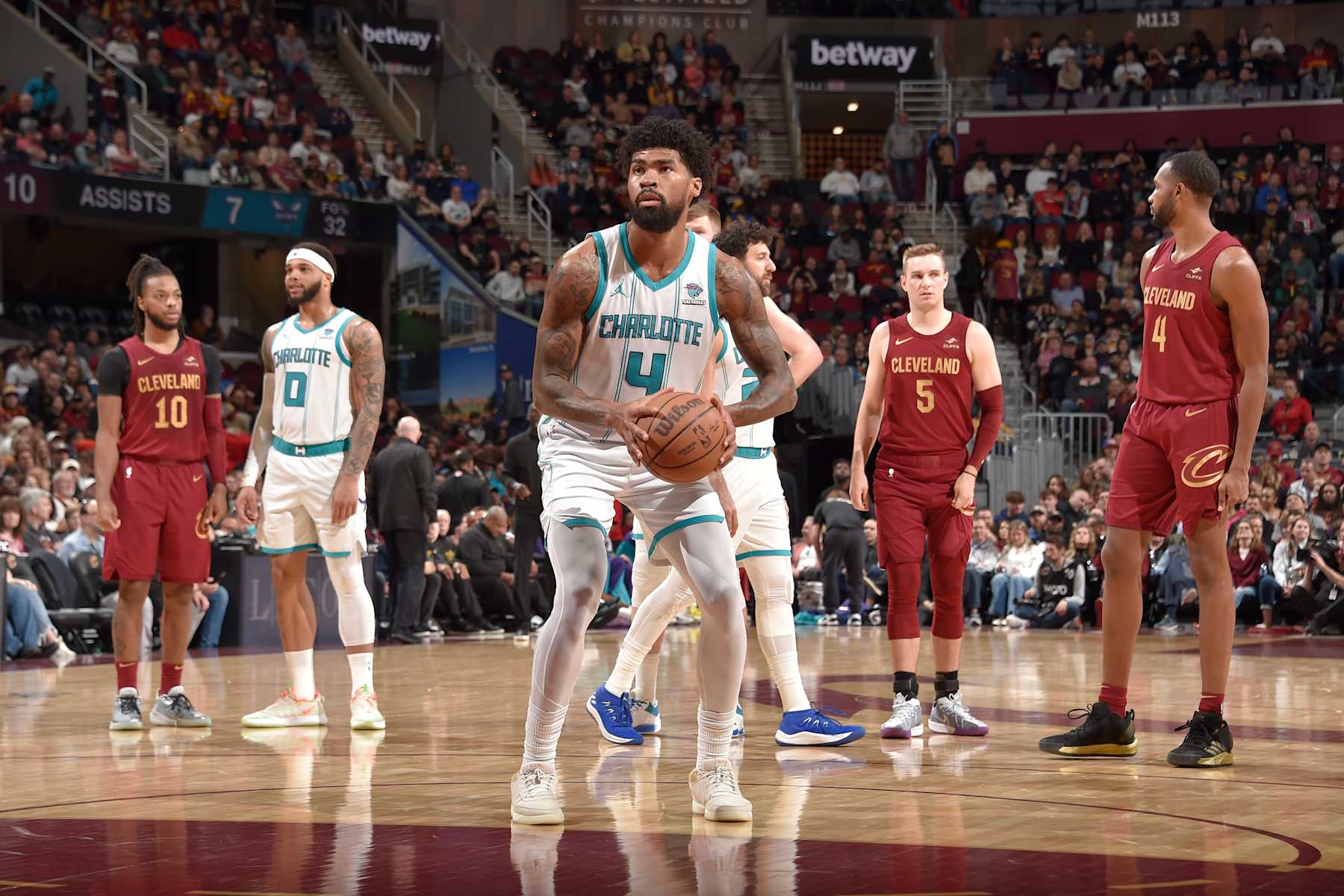 CLEVELAND, OH - MARCH 25: Nick Richards #4 of the Charlotte Hornets shoots a free throw during the game against the Cleveland Cavaliers on March 25, 2024 at Rocket Mortgage FieldHouse in Cleveland, Ohio. NOTE TO USER: User expressly acknowledges and agrees that, by downloading and/or using this Photograph, user is consenting to the terms and conditions of the Getty Images License Agreement. Mandatory Copyright Notice: Copyright 2024 NBAE (Photo by David Liam Kyle/NBAE via Getty Images)