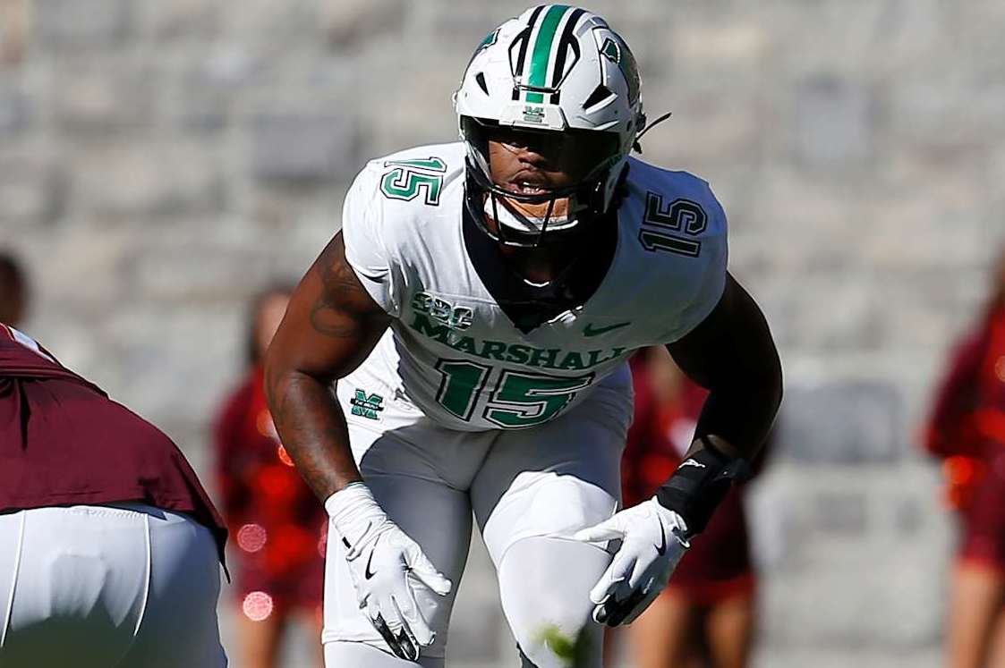 BLACKSBURG, VA - SEPTEMBER 07: Marshall Thundering Herd defensive lineman Mike Green (15) peeks into the backfield during a college football game between the Marshall Thundering Herd and the Virginia Tech Hokies on September 7, 2024, at Lane Stadium in Blacksburg, VA. (Photo by Lee Coleman/Icon Sportswire via Getty Images)