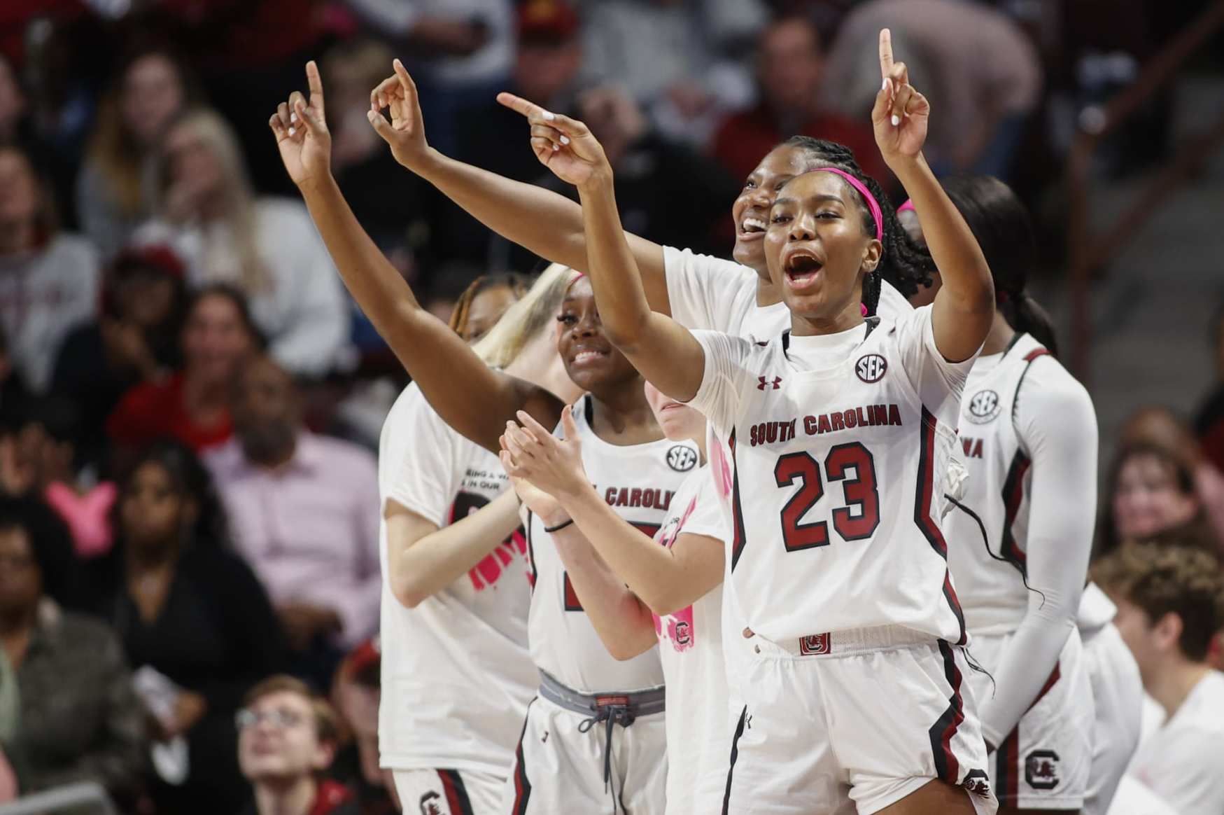 South Carolina guard Bree Hall (23) joins teammates reacting after a blocked shot by their team as they play against LSU during the second half of an NCAA college basketball game in Columbia, S.C., Sunday, Feb. 12, 2023. (AP Photo/Nell Redmond)