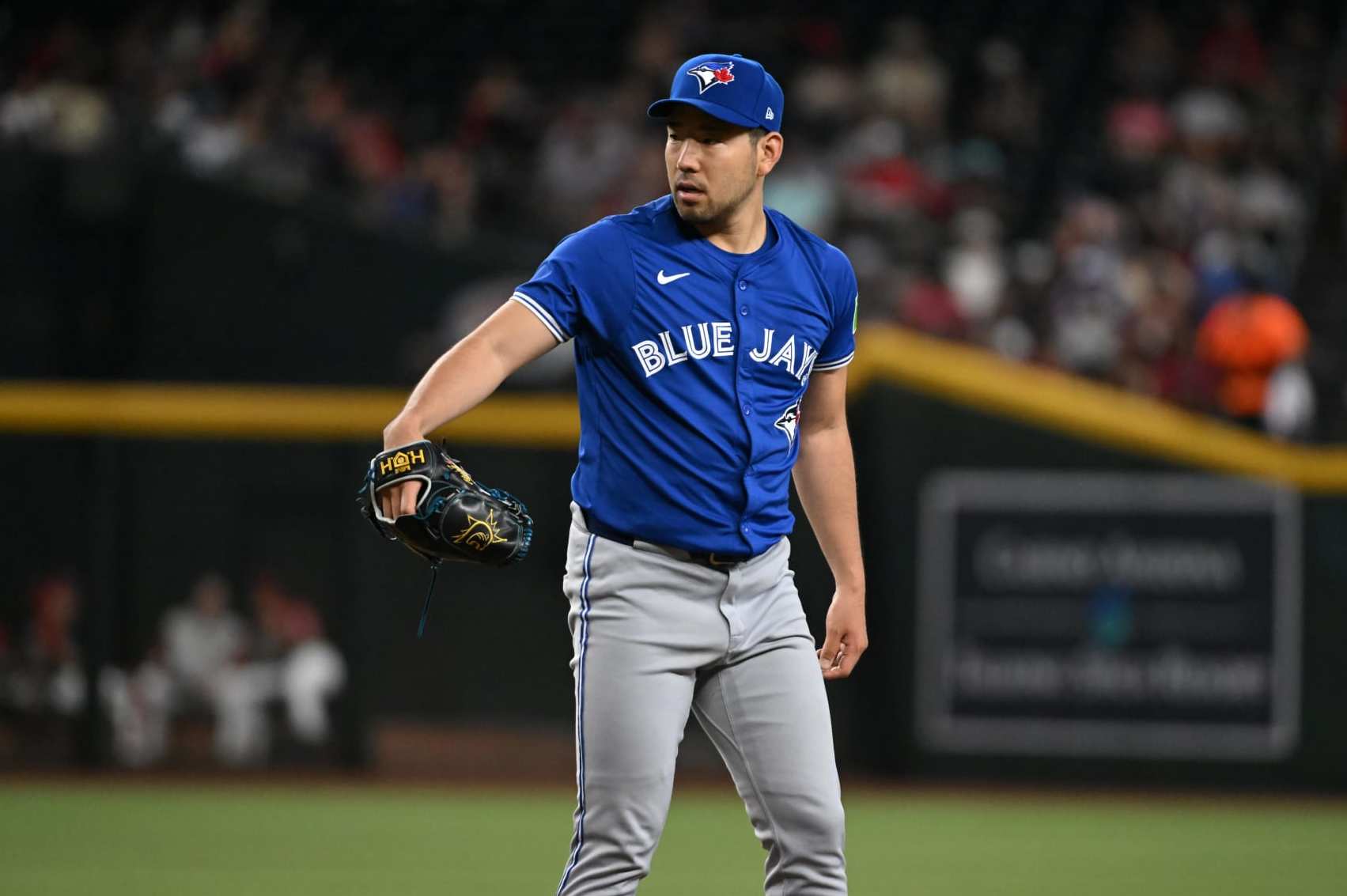 PHOENIX, ARIZONA - JULY 14: Yusei Kikuchi #16 of the Toronto Blue Jays delivers a first inning pitch against the Arizona Diamondbacks at Chase Field on July 14, 2024 in Phoenix, Arizona. (Photo by Norm Hall/Getty Images)
