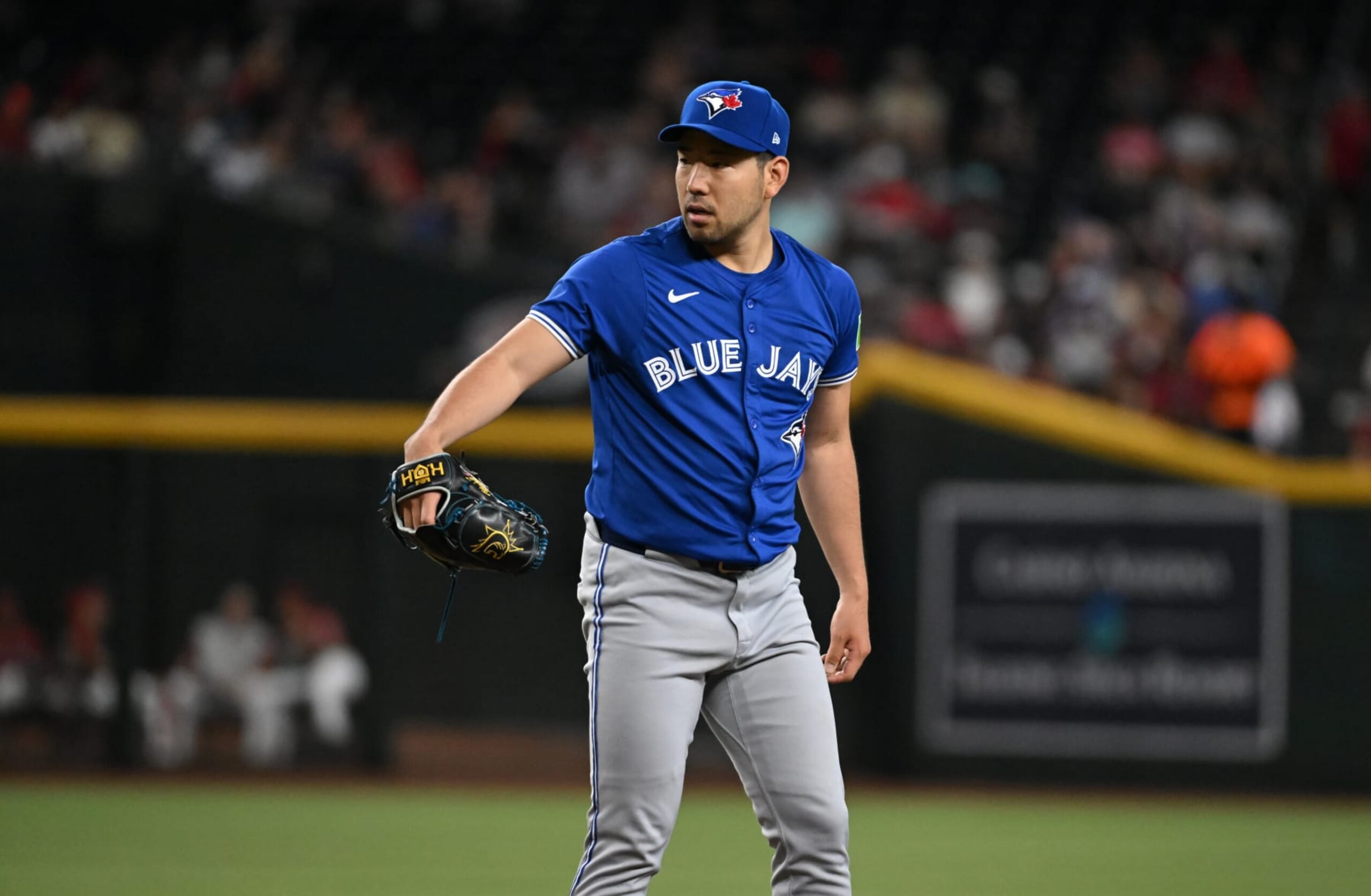 PHOENIX, ARIZONA - JULY 14: Yusei Kikuchi #16 of the Toronto Blue Jays delivers a first inning pitch against the Arizona Diamondbacks at Chase Field on July 14, 2024 in Phoenix, Arizona. (Photo by Norm Hall/Getty Images)